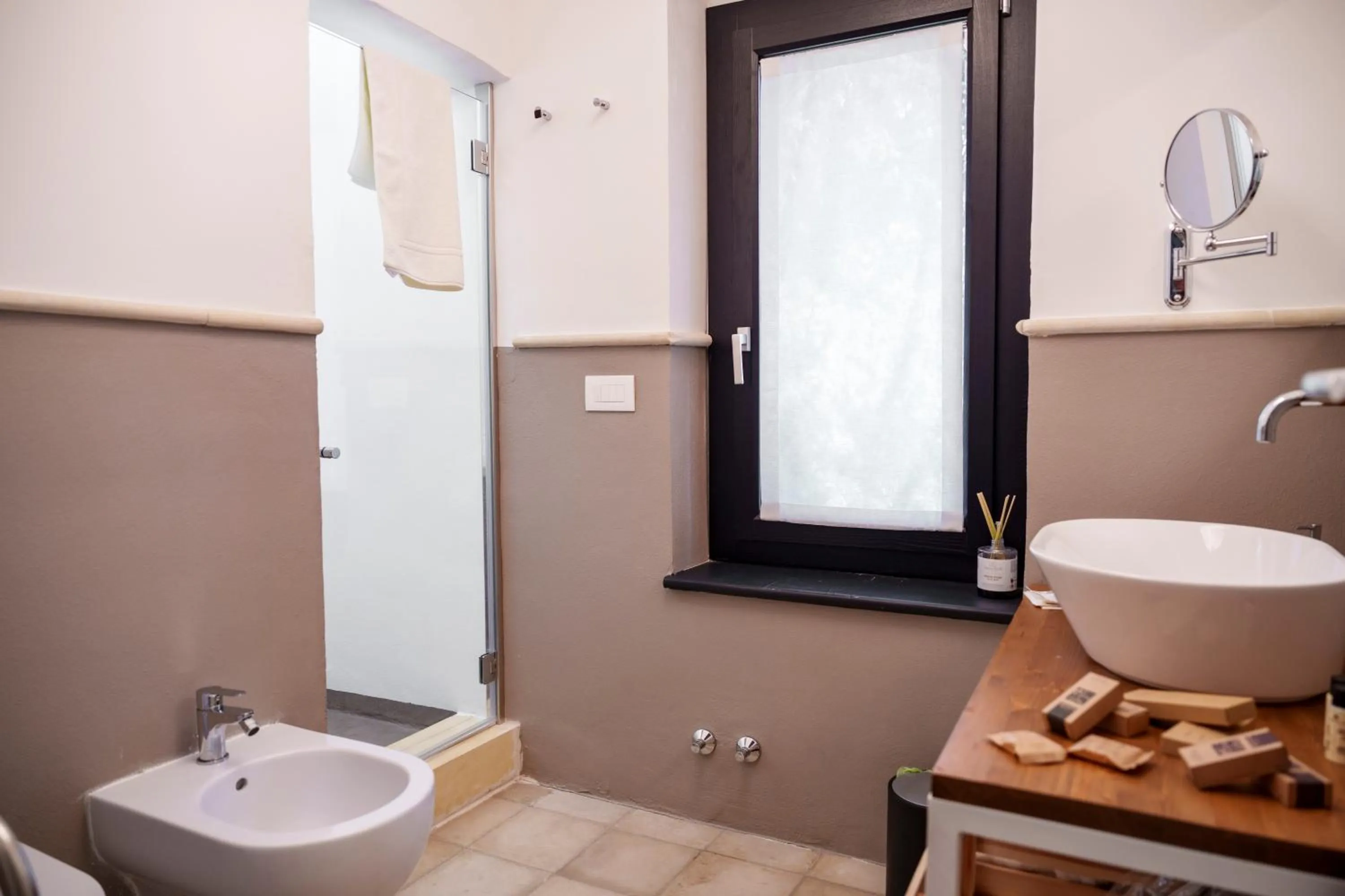 Bathroom in Villa Neviera Wine Resort & Spa by Cantine Due Palme