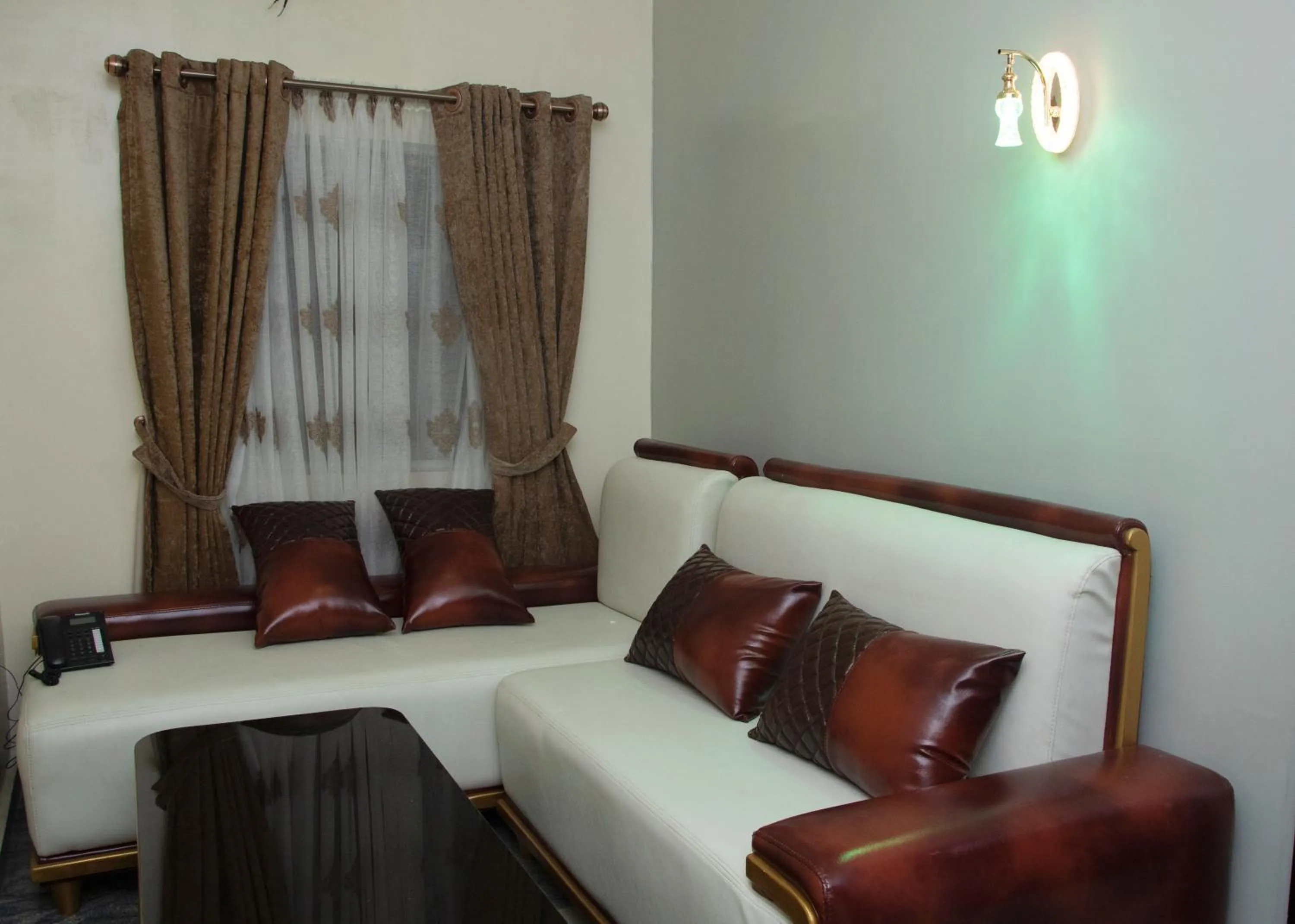 Seating area, Bed in Grand Bohabs Hotel