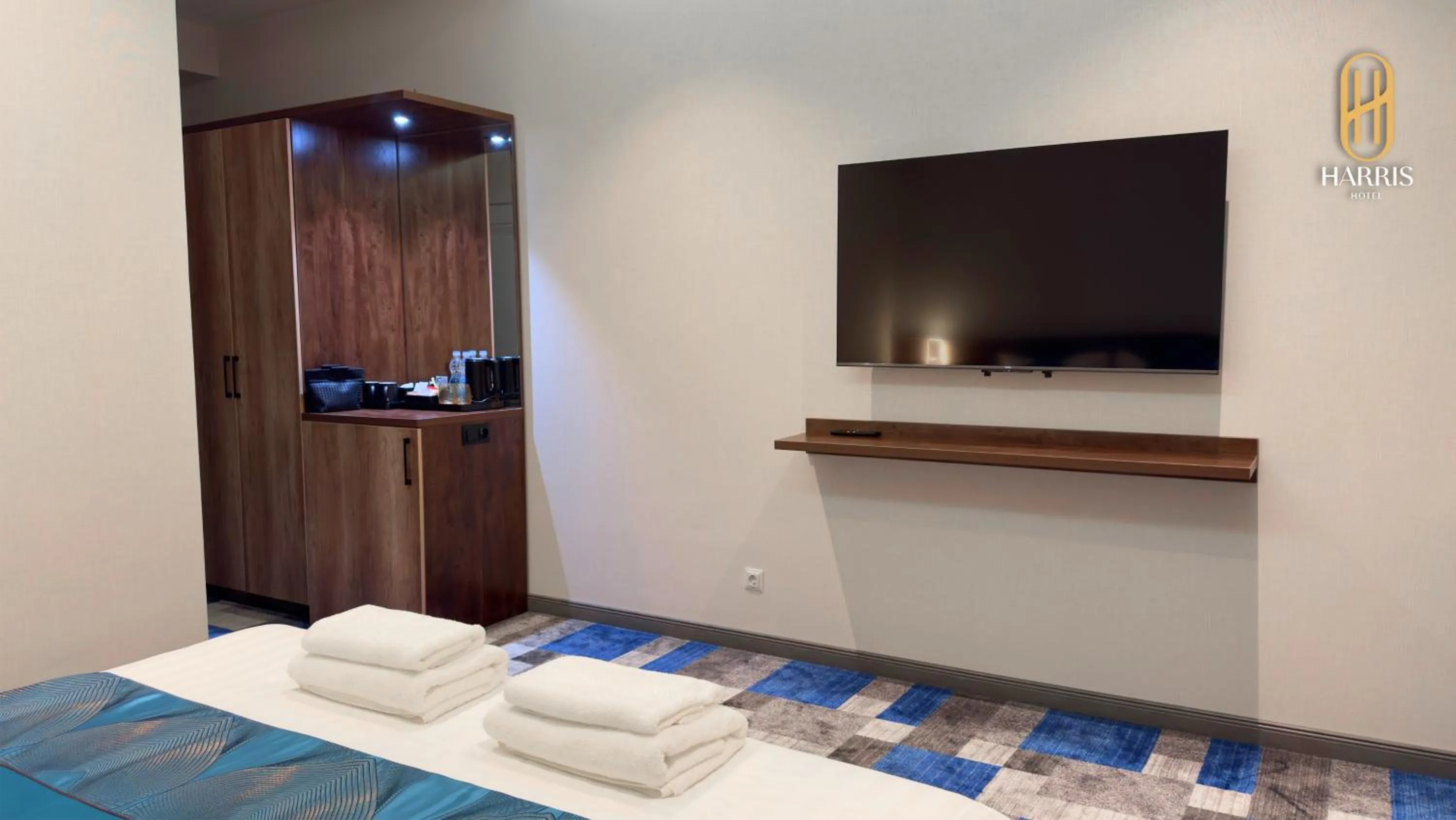 TV and multimedia, Bed in Harris Hotel Spa&Fitness