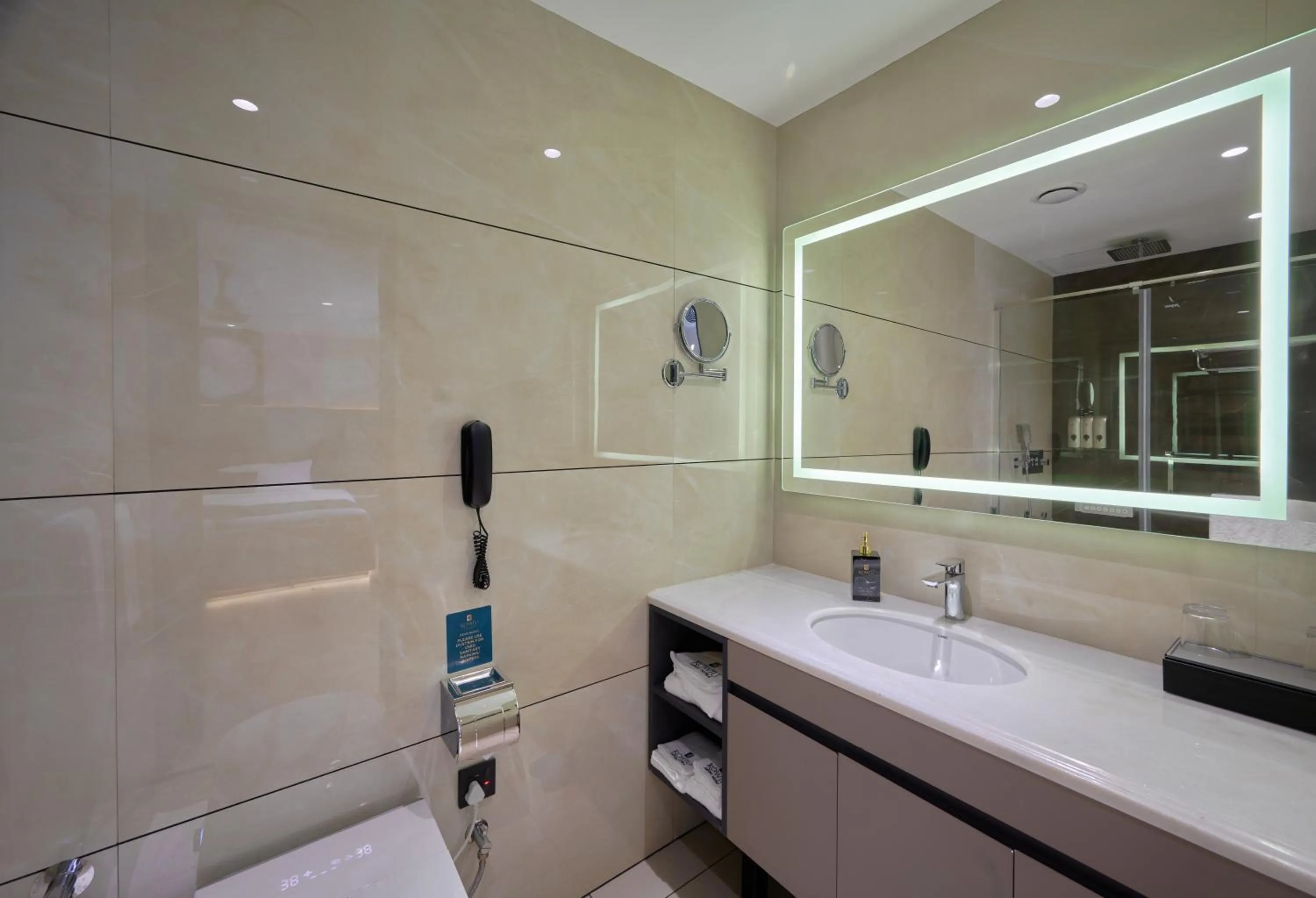 Bathroom in Kowju Airport Hotel Calicut