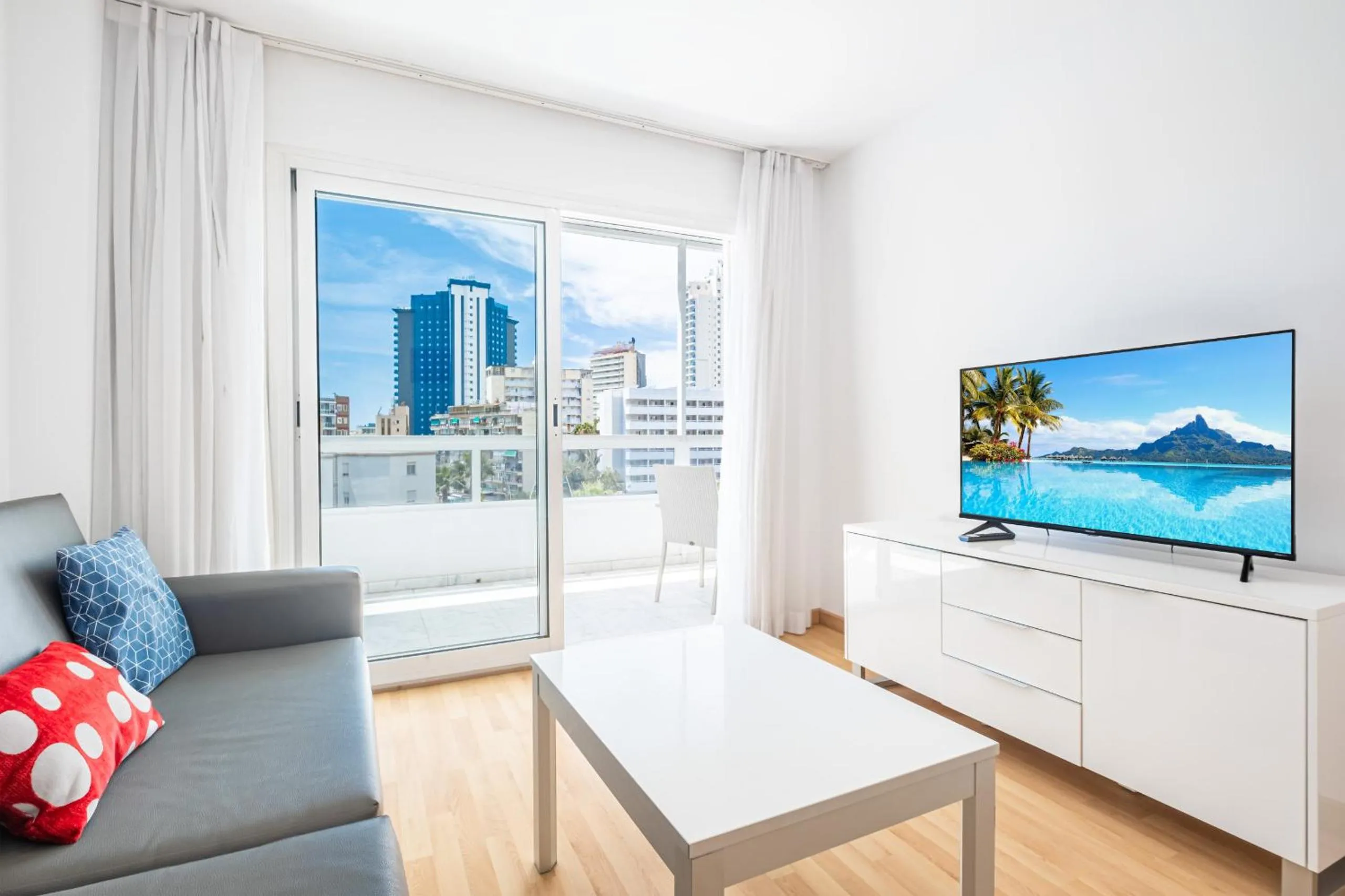 TV and multimedia in Apartamentos Les Dunes Centro Levante Beach