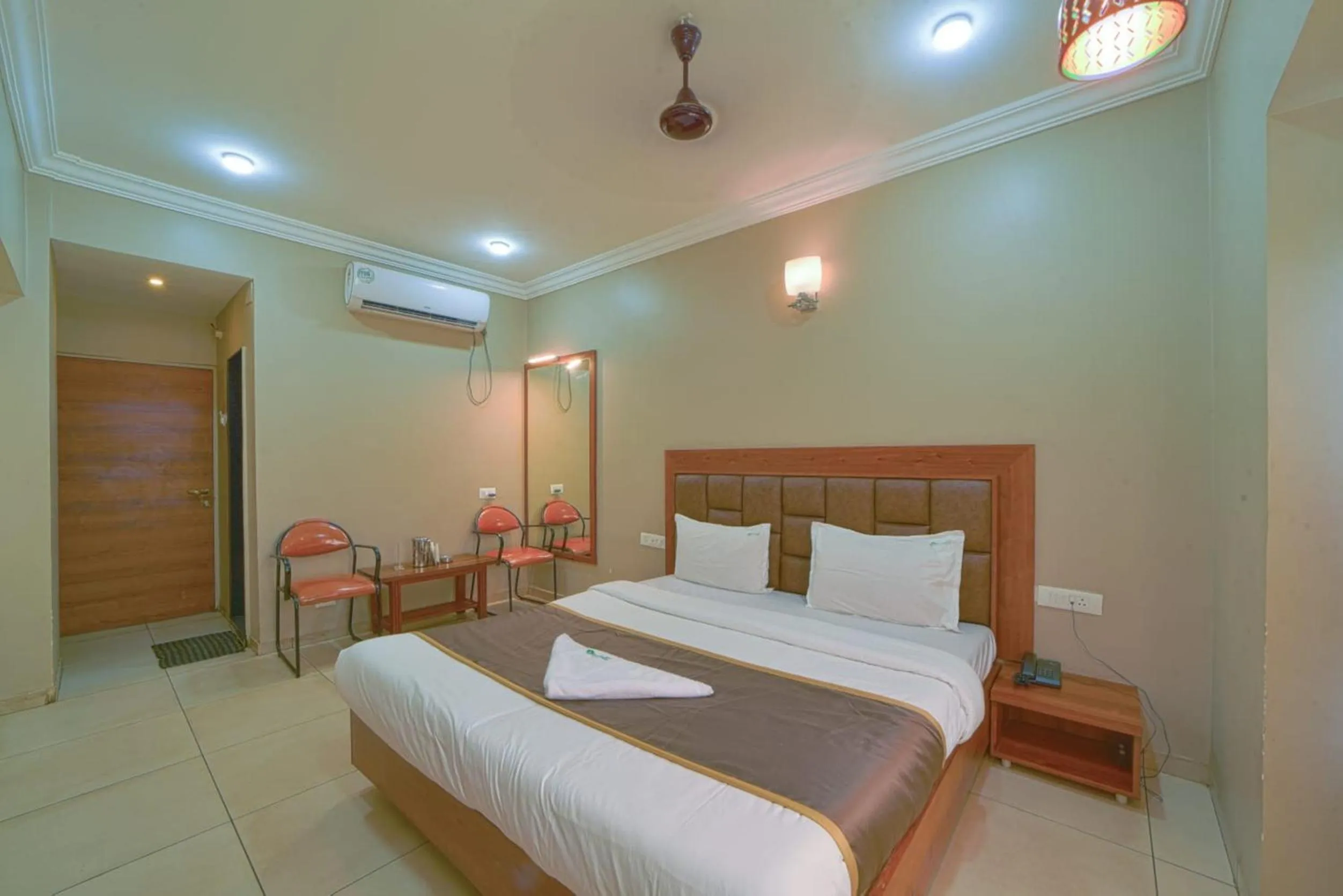 Bedroom in Hotel Vrindavan Deluxe Kolhapur NEAR CENTRAL BUS STAND