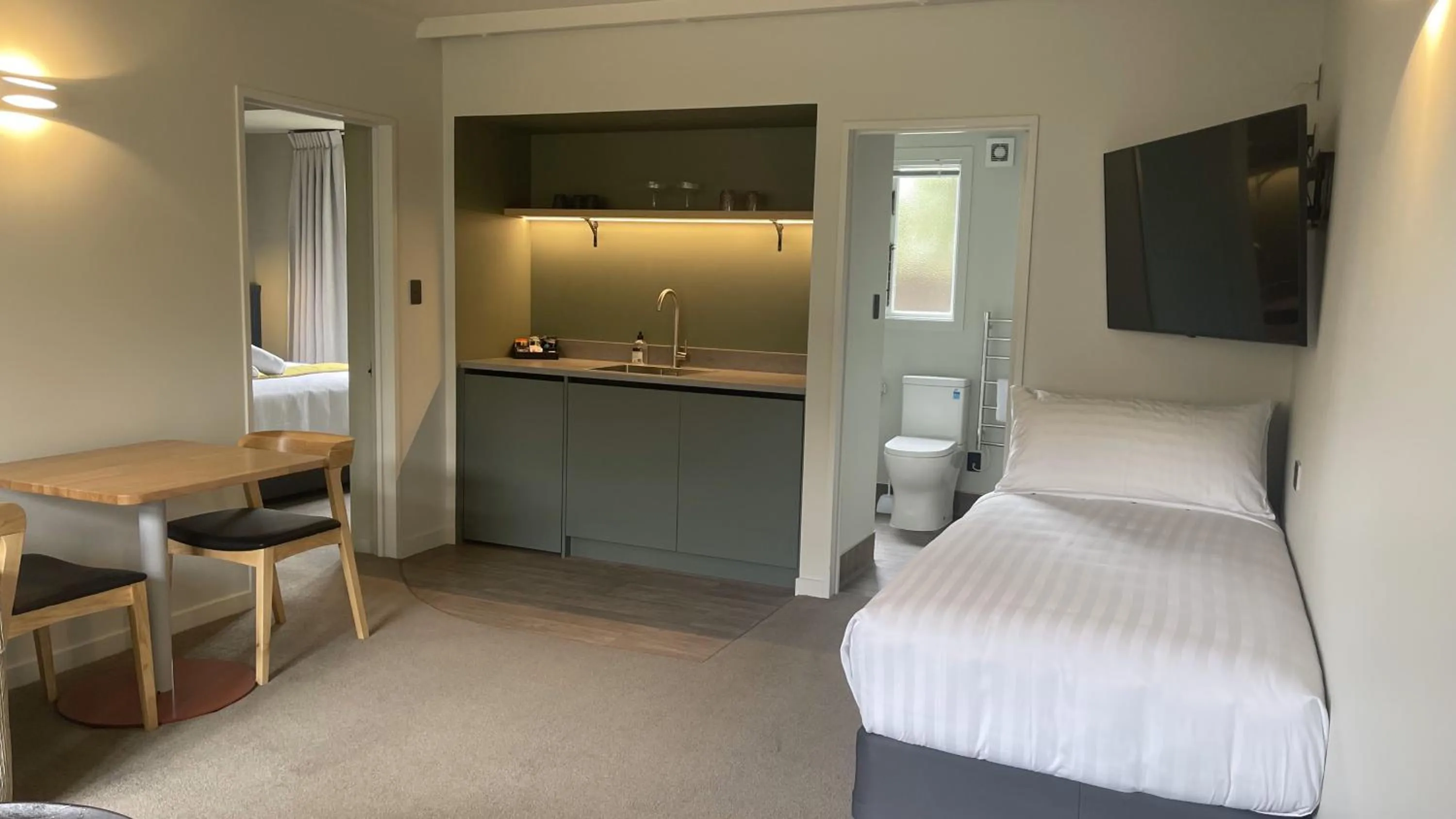 Bed in The Elmwood Motel