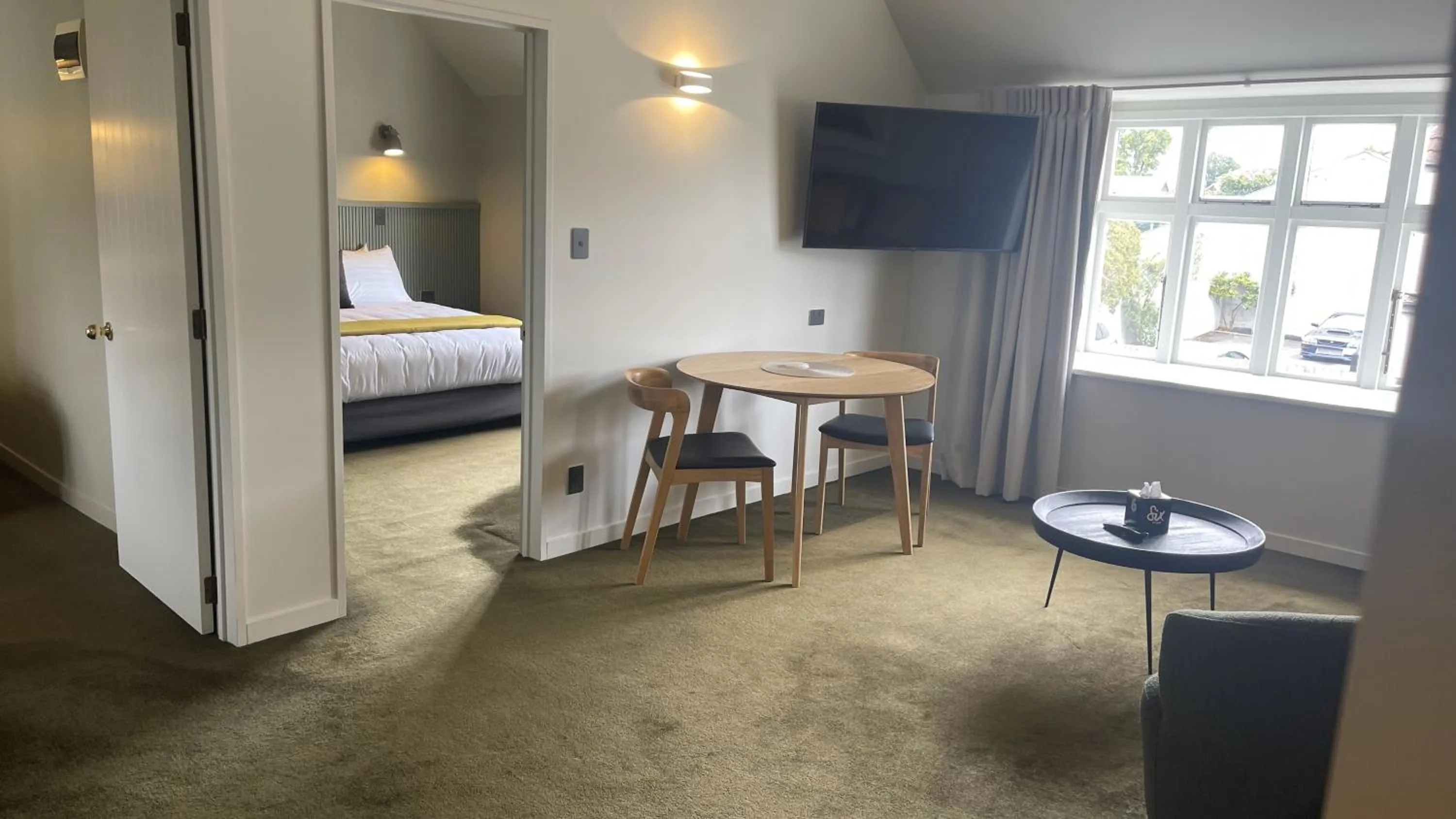 Bed in The Elmwood Motel