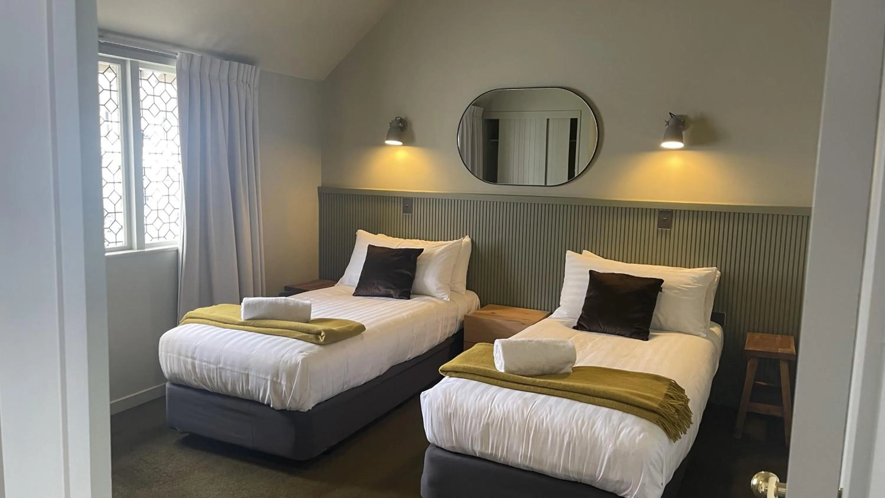 Bed in The Elmwood Motel