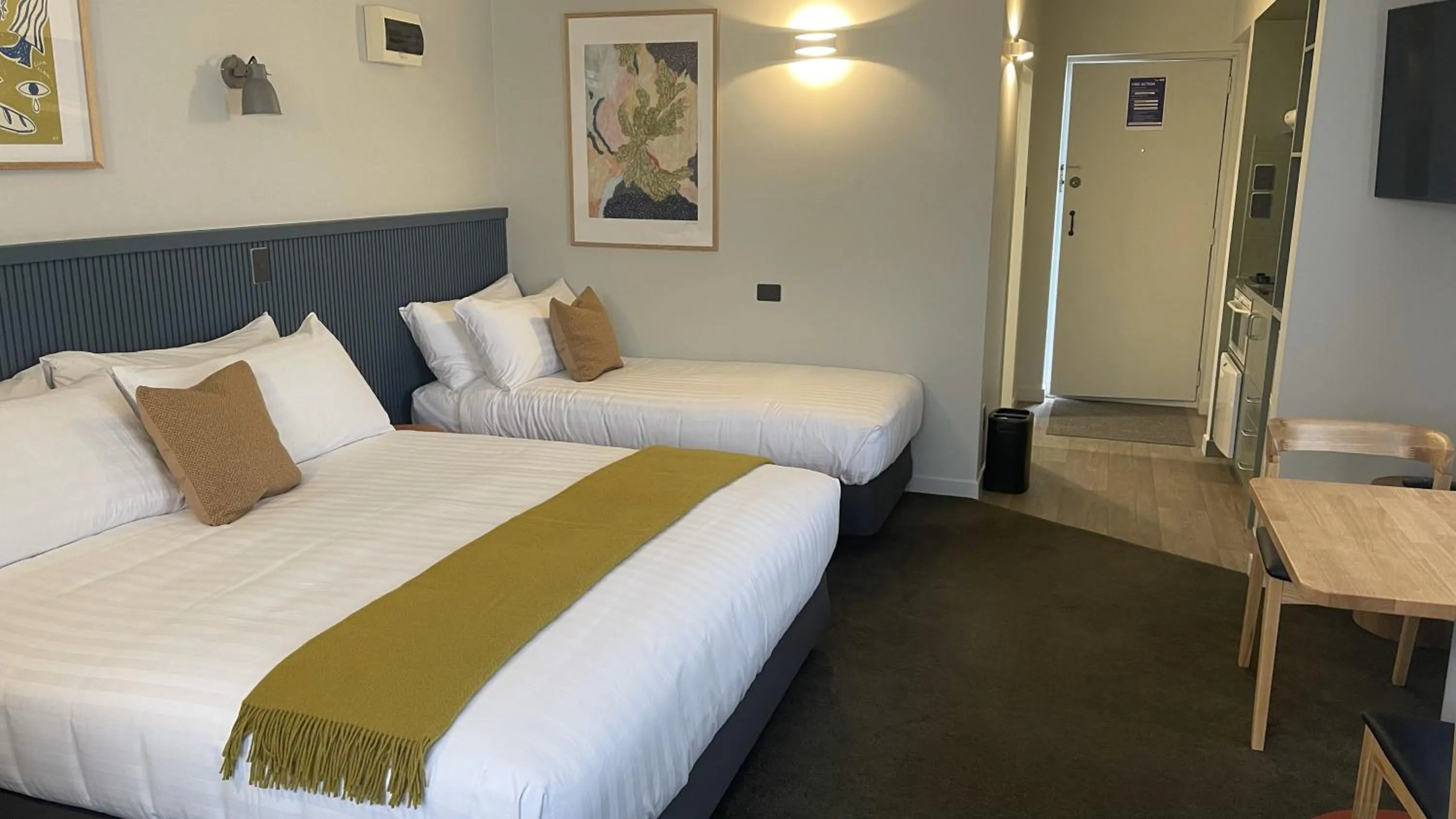 Bed in The Elmwood Motel