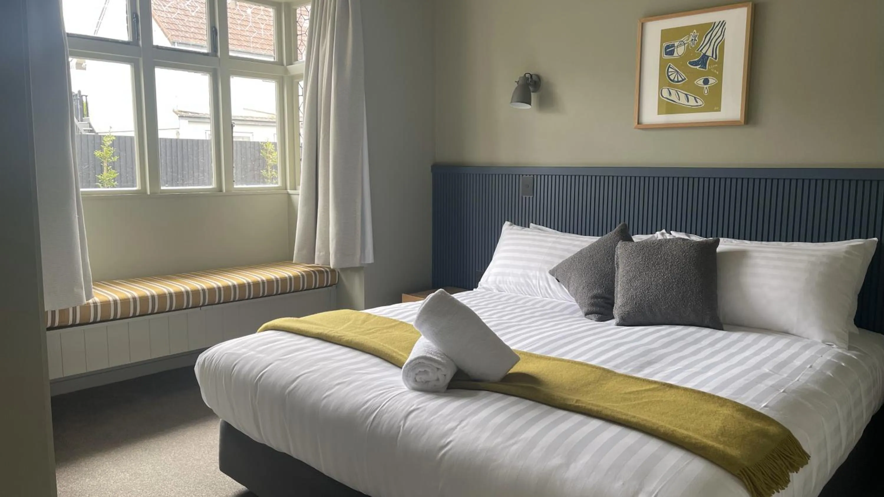 Bed in The Elmwood Motel