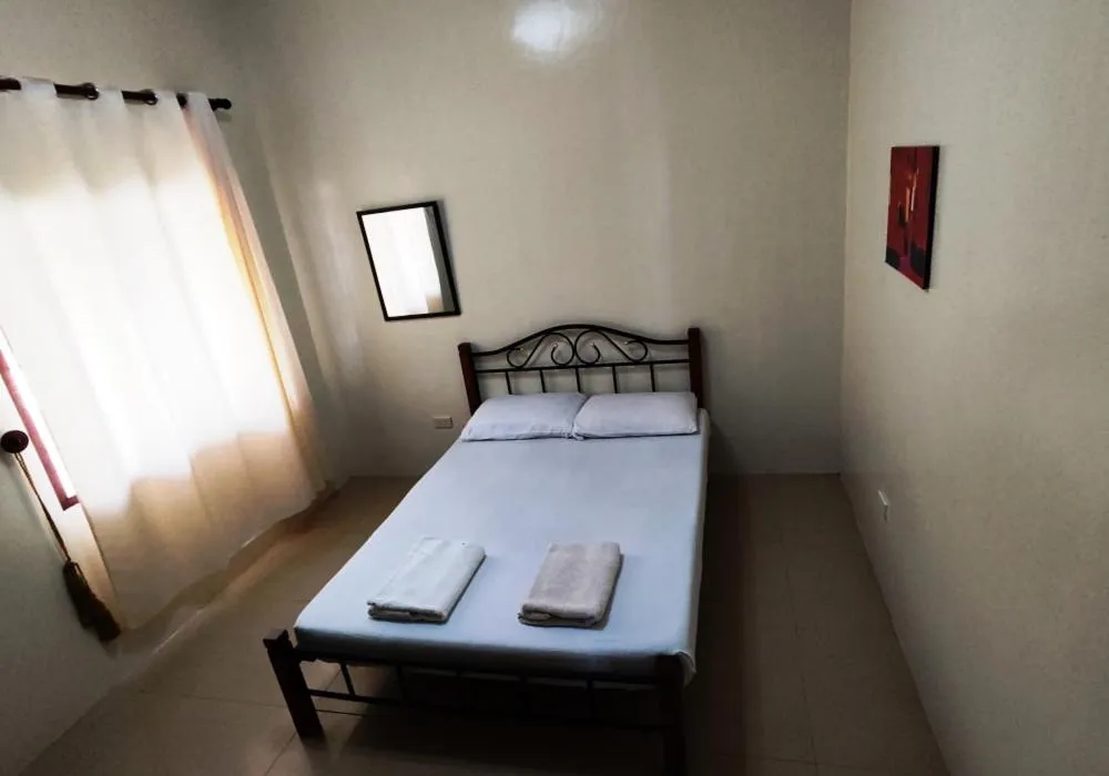 Bedroom, Bed in Bluewaves Resort - Basdaku by Hiverooms