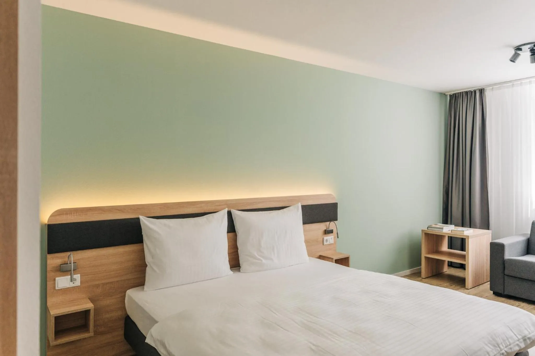 Bed in Homaris Corner Hotel