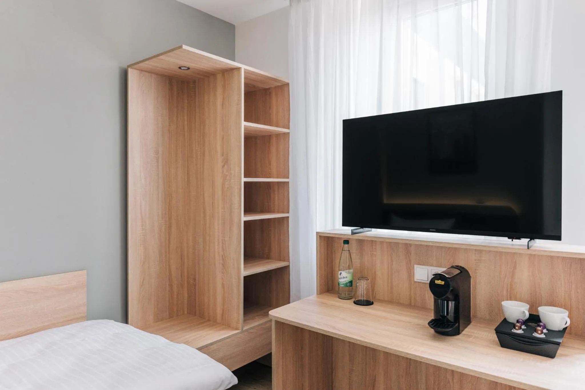 Bed in Homaris Corner Hotel