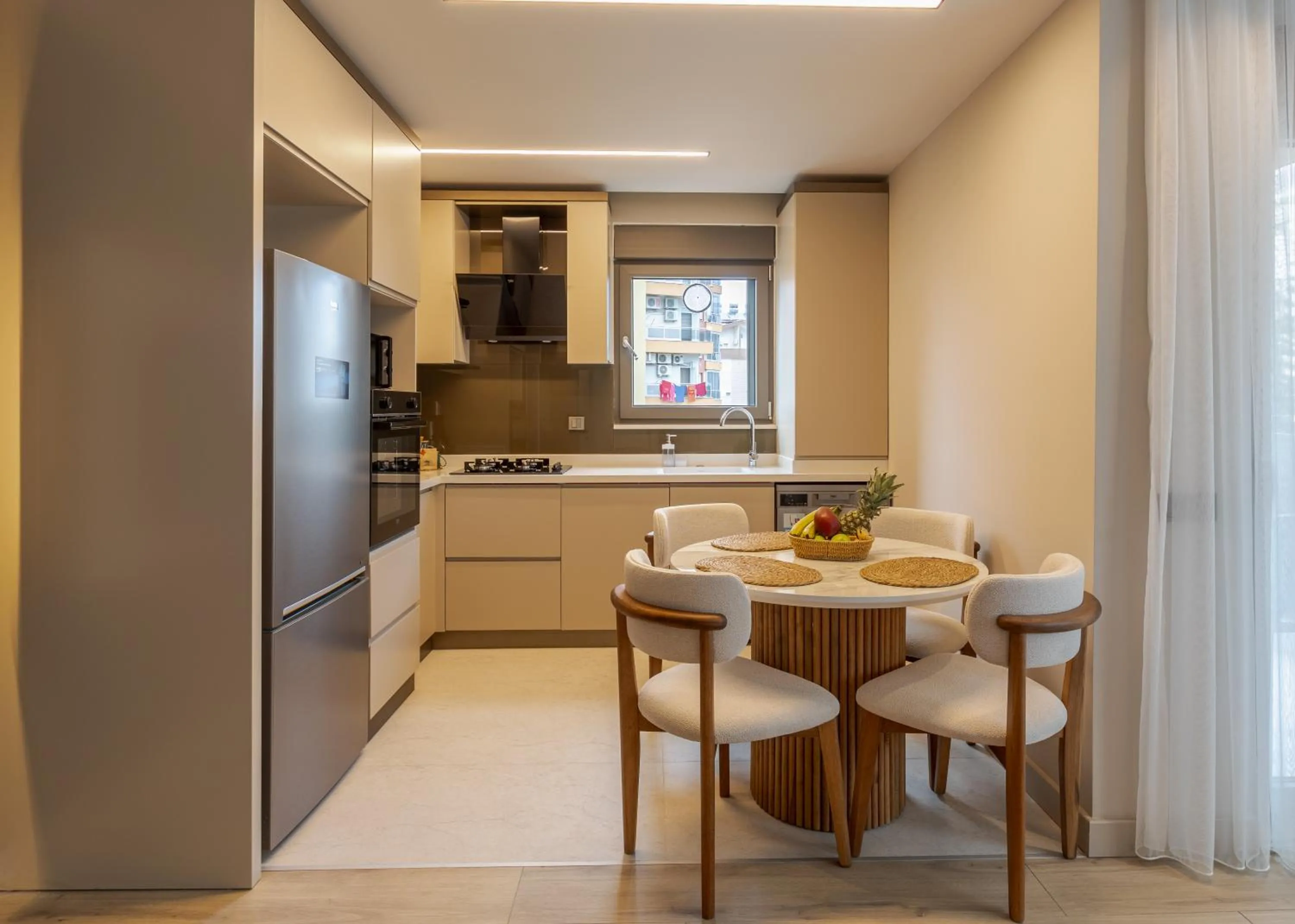 Kitchen or kitchenette in Los Suites