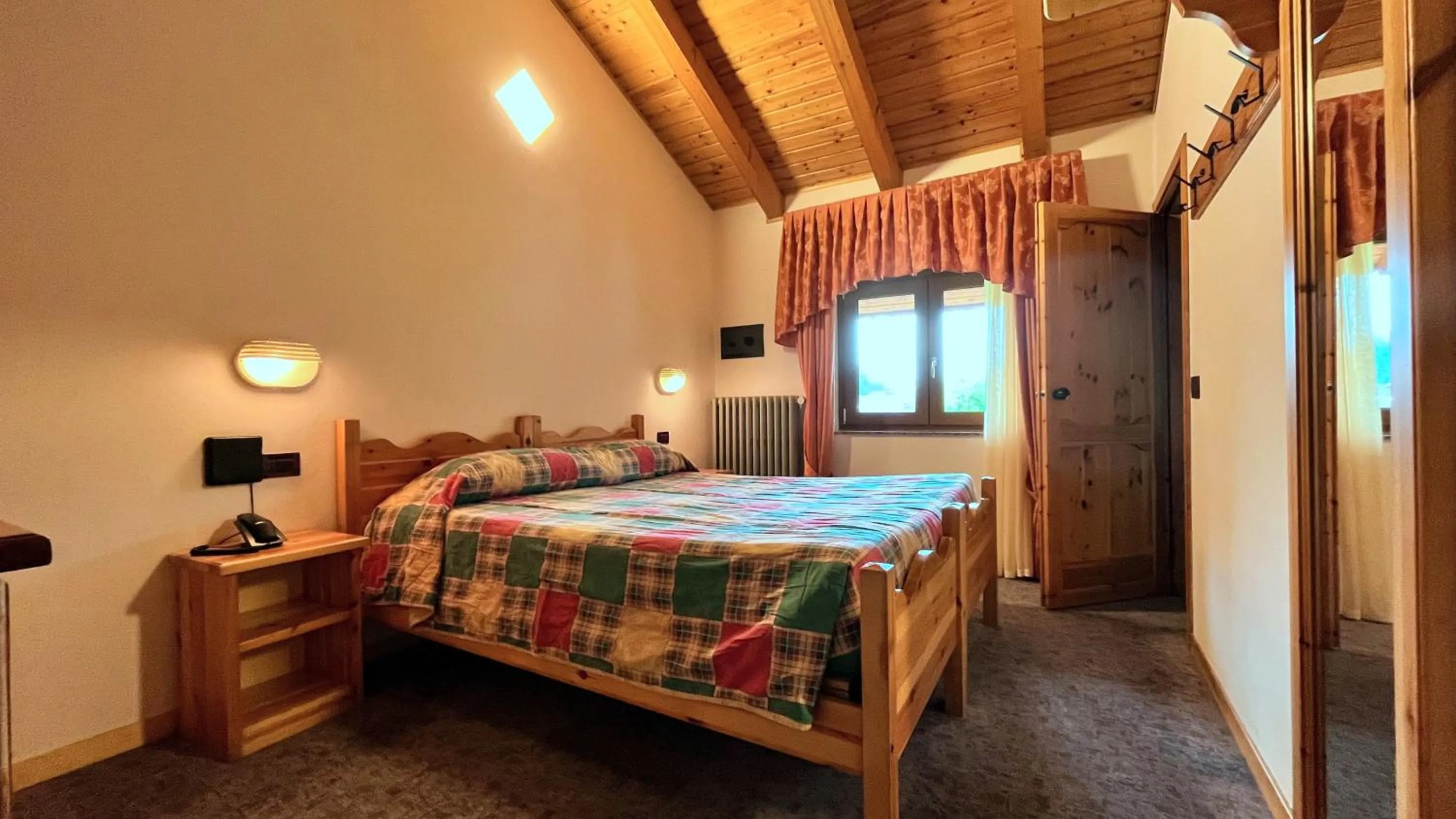 Bed in Hotel Le Pinete