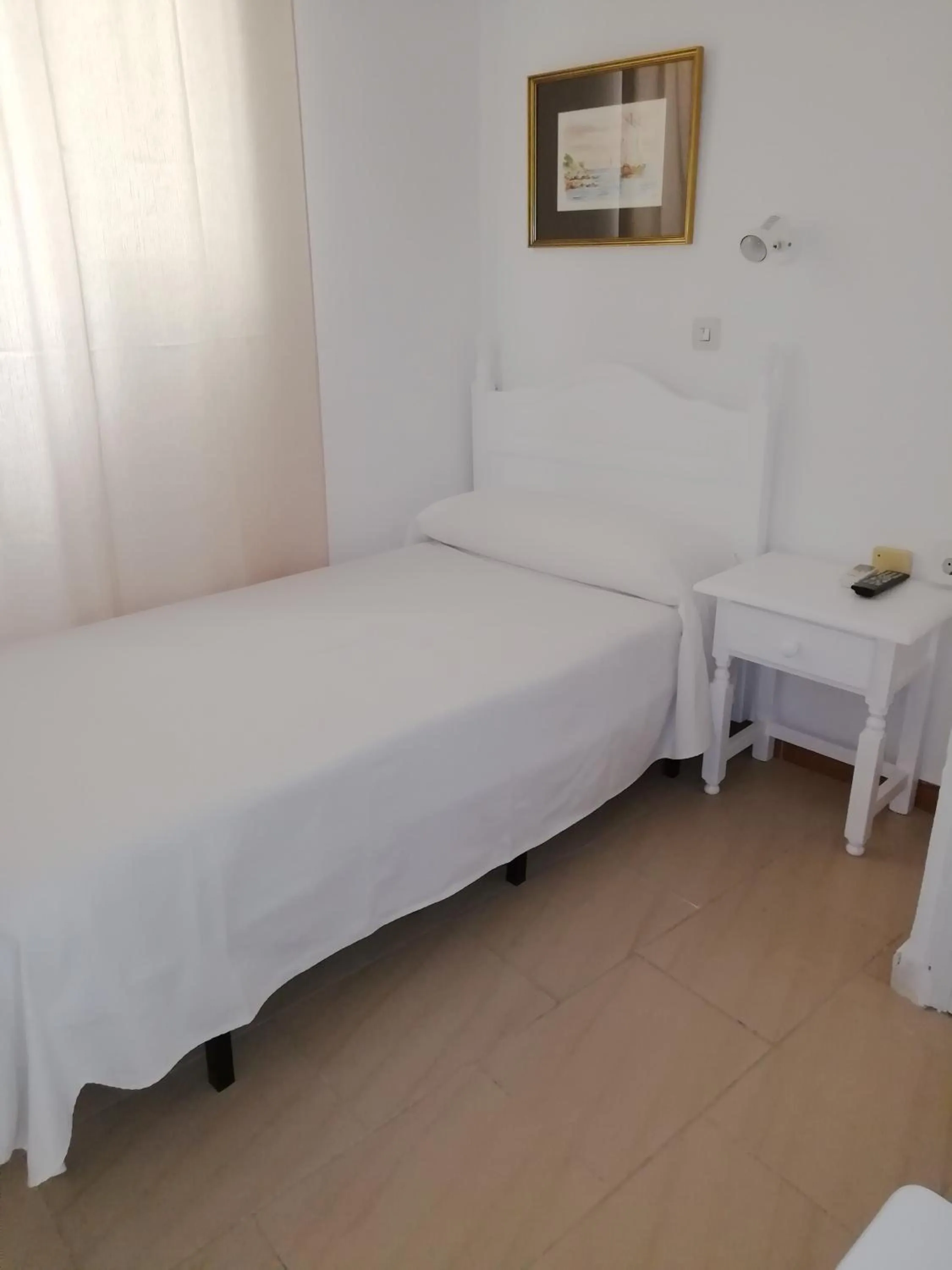 Bed in Hostal Sierpes