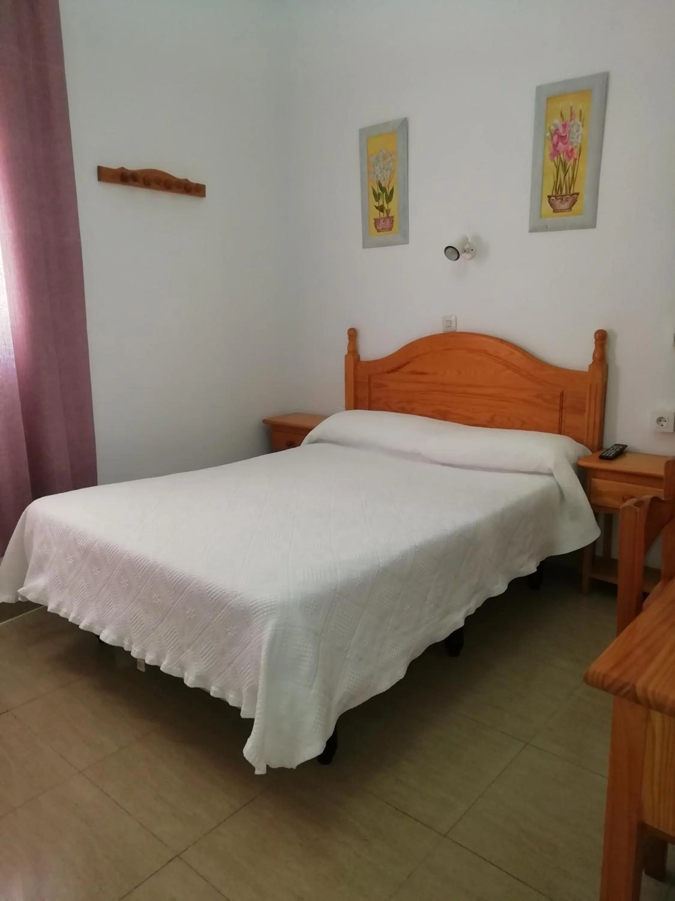 Bed in Hostal Sierpes