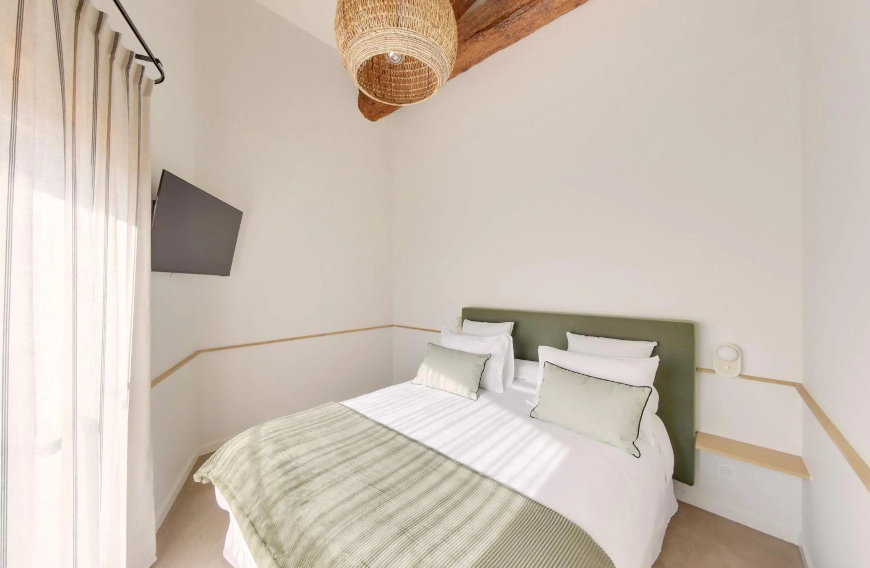 Bed in La Maison Gaïa Hôtel & Spa