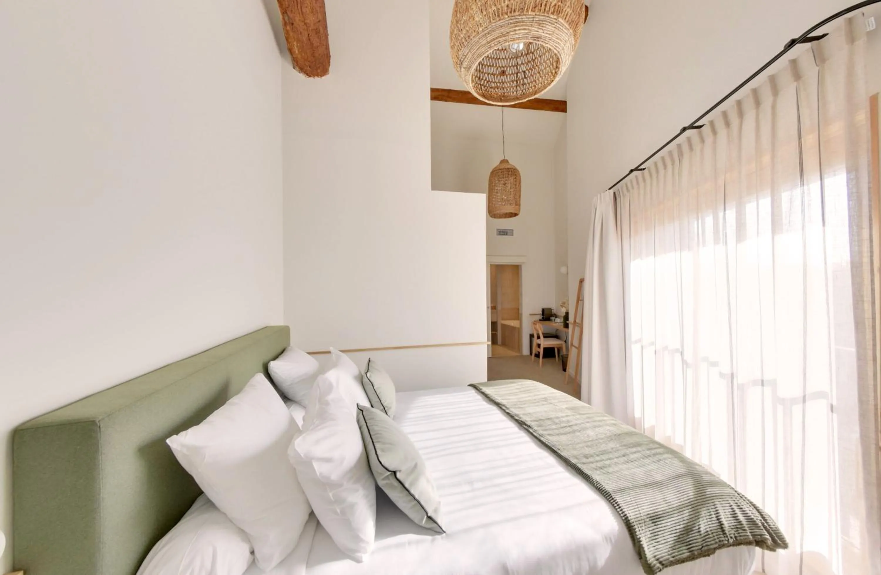 Bed in La Maison Gaïa Hôtel & Spa