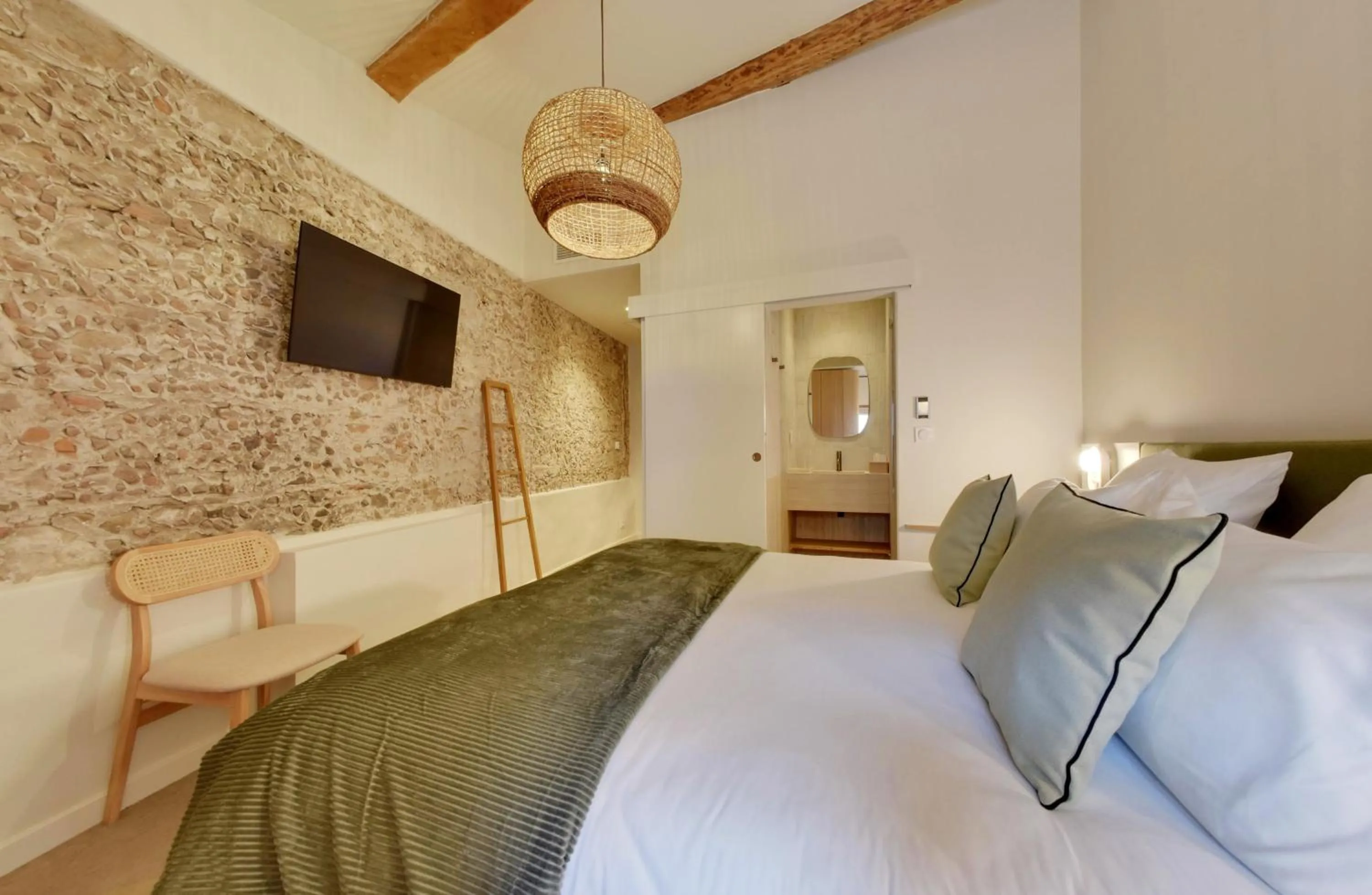 Bed in La Maison Gaïa Hôtel & Spa