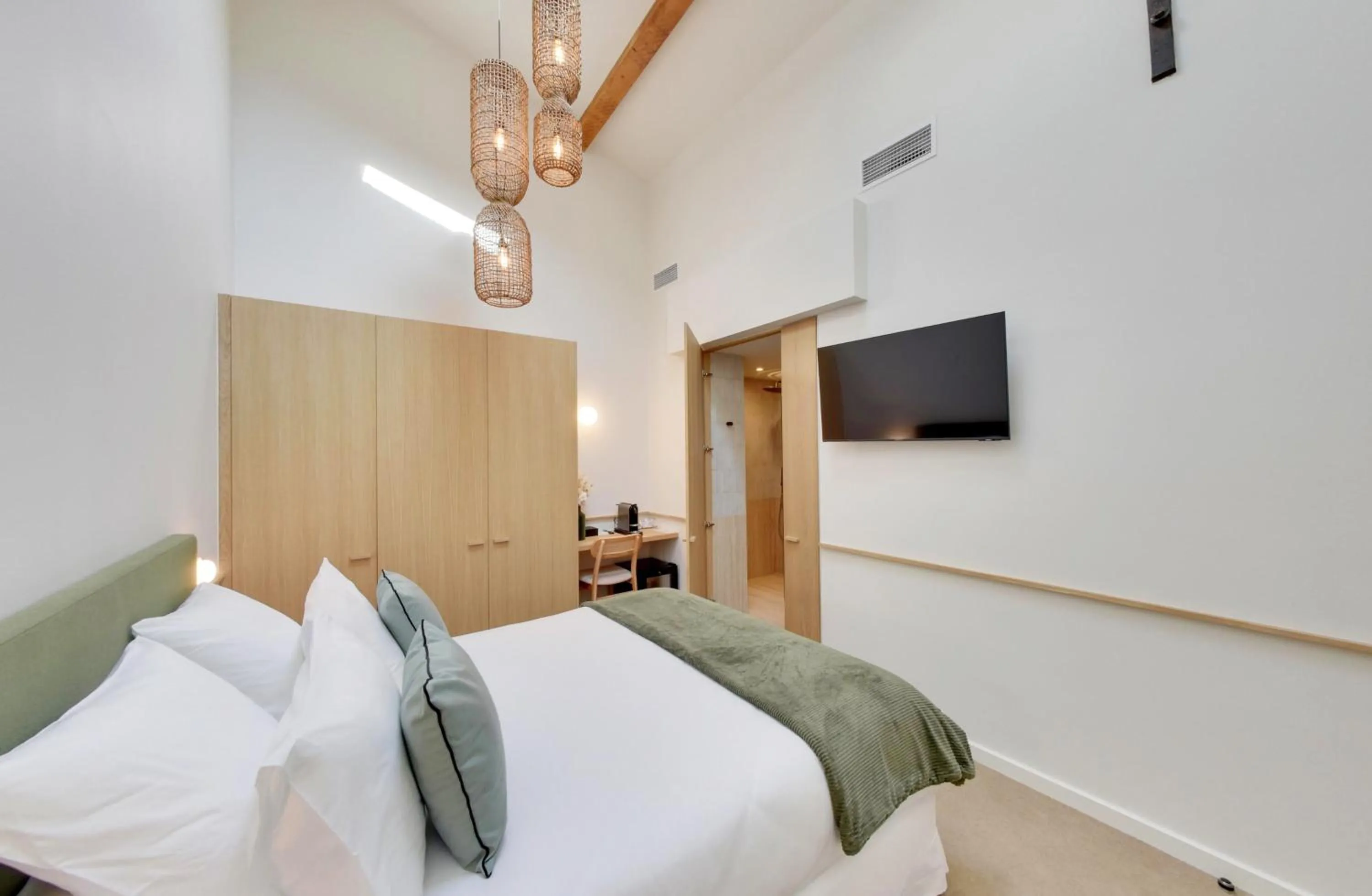 Bed in La Maison Gaïa Hôtel & Spa