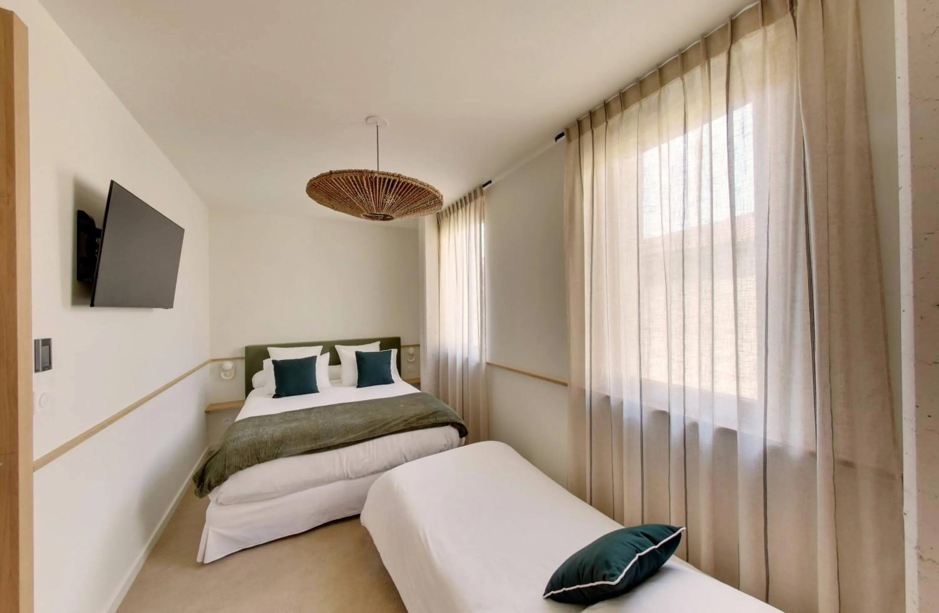 Bed in La Maison Gaïa Hôtel & Spa