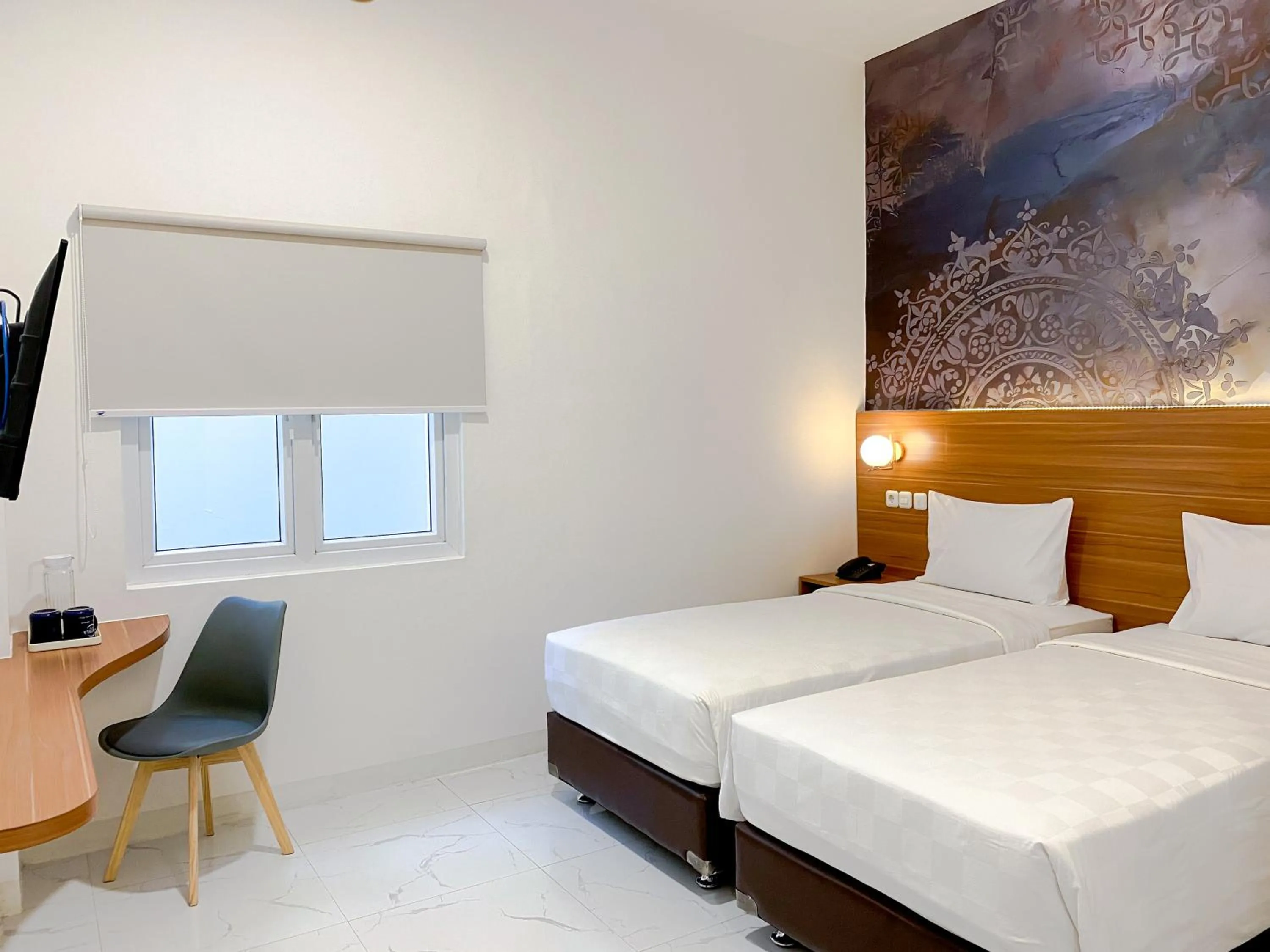 Bed in Cordex Hotel Marelan Medan