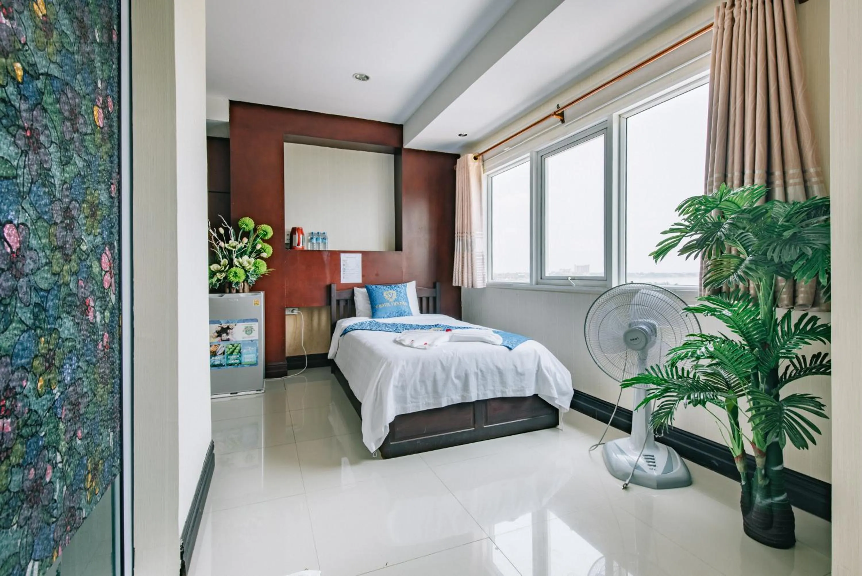 Bed in V Hotel Vientiane