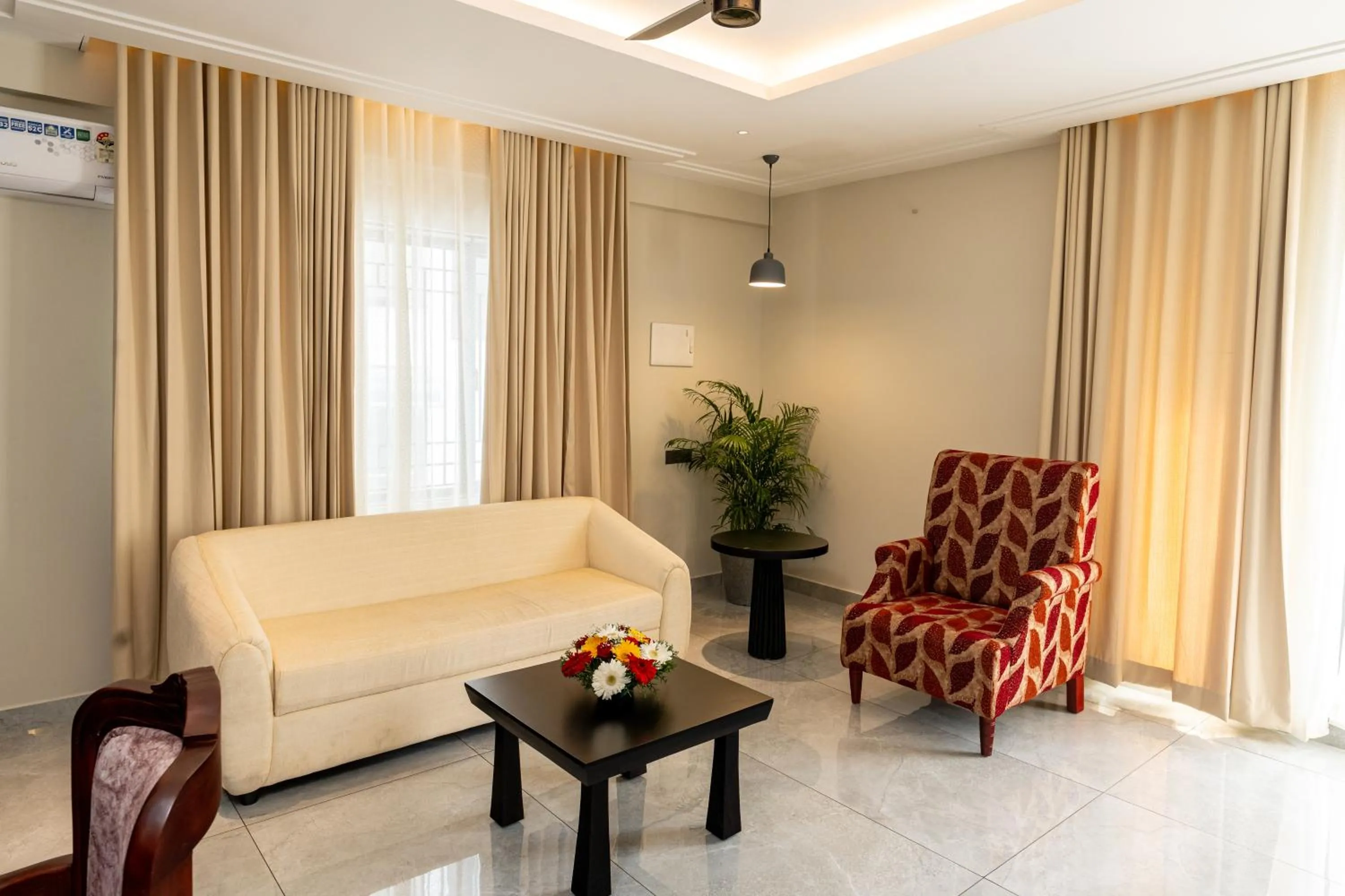 Suite - single occupancy in Saravana Grand Suites - A Unit of Saravana Bhavan Veg Tables Kochi
