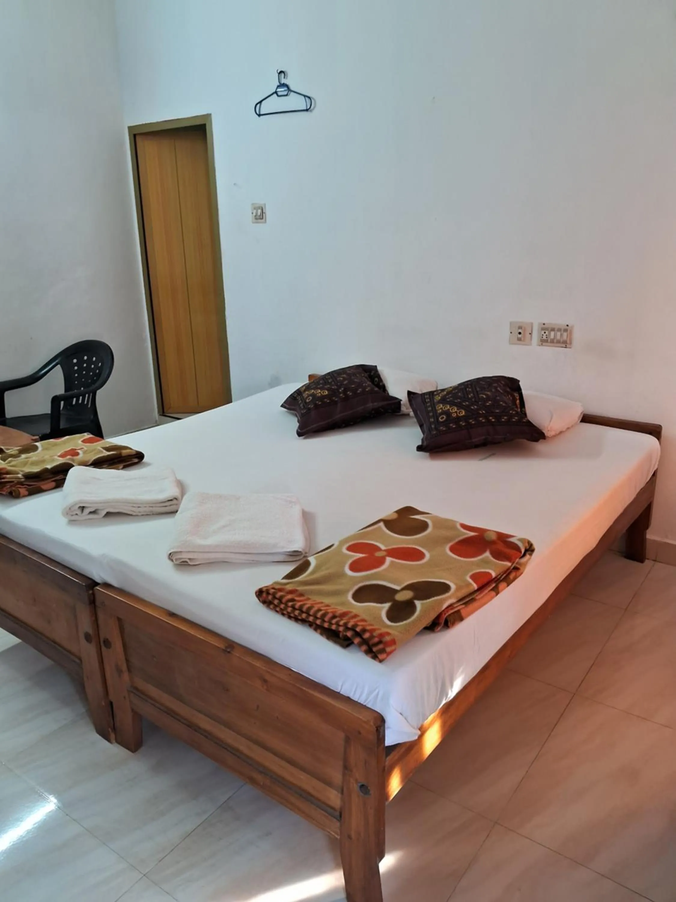 Bed in Deauvill Home Stay