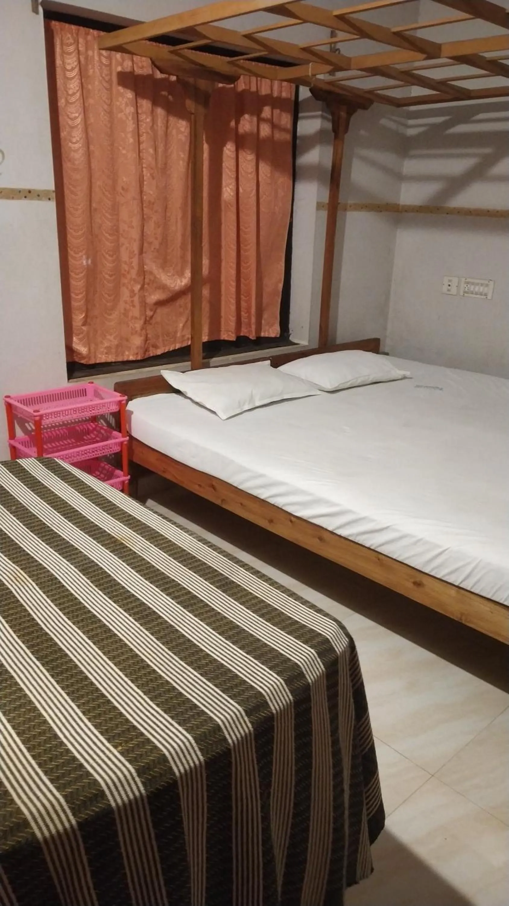 Bed in Deauvill Home Stay