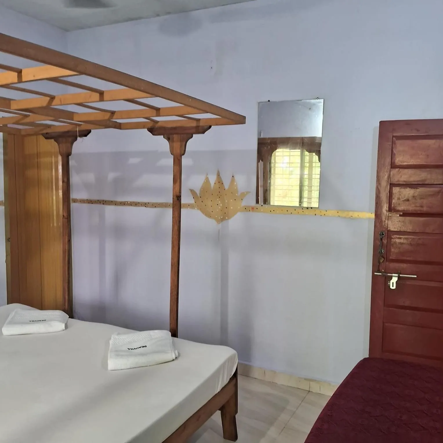 Bed in Deauvill Home Stay