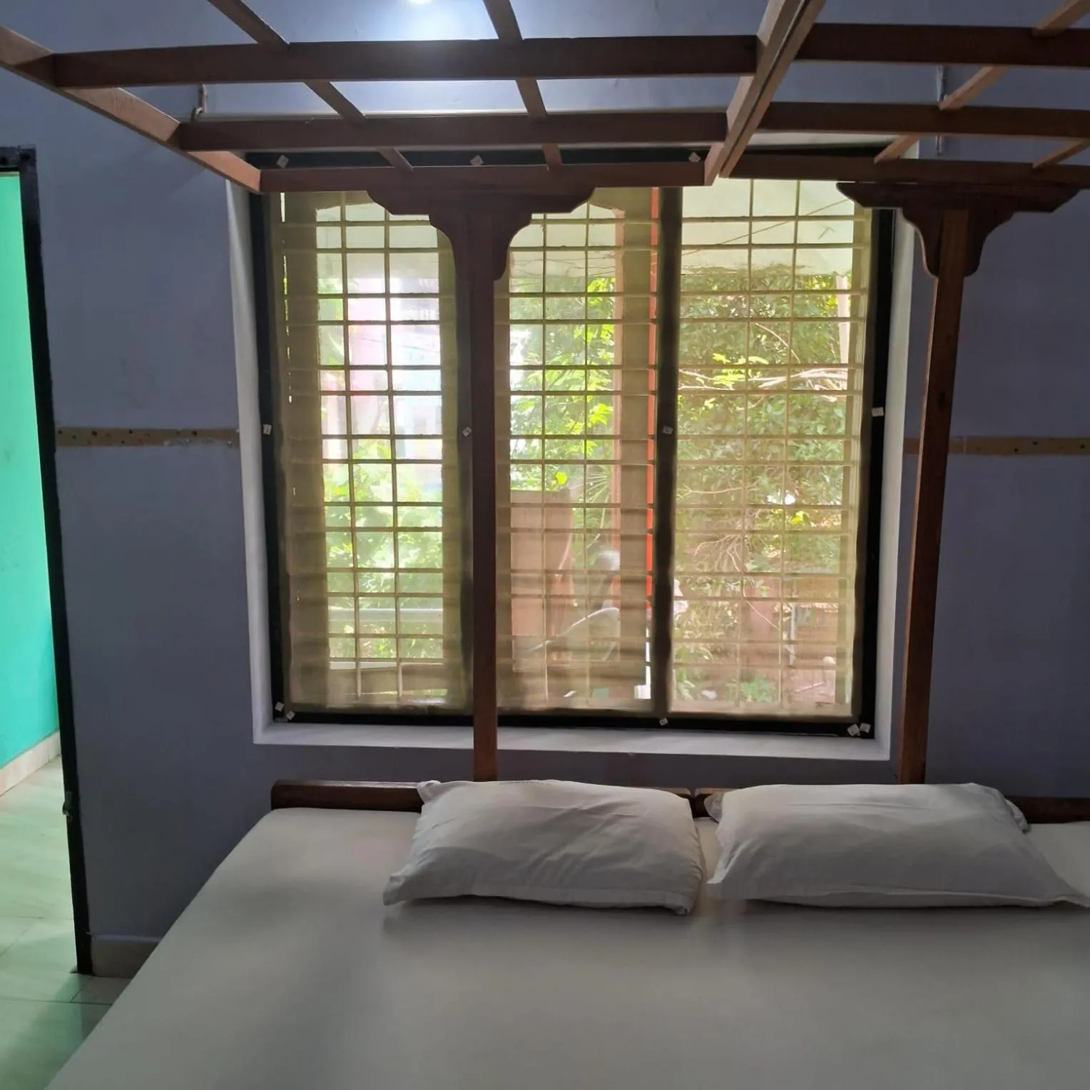 Bed in Deauvill Home Stay