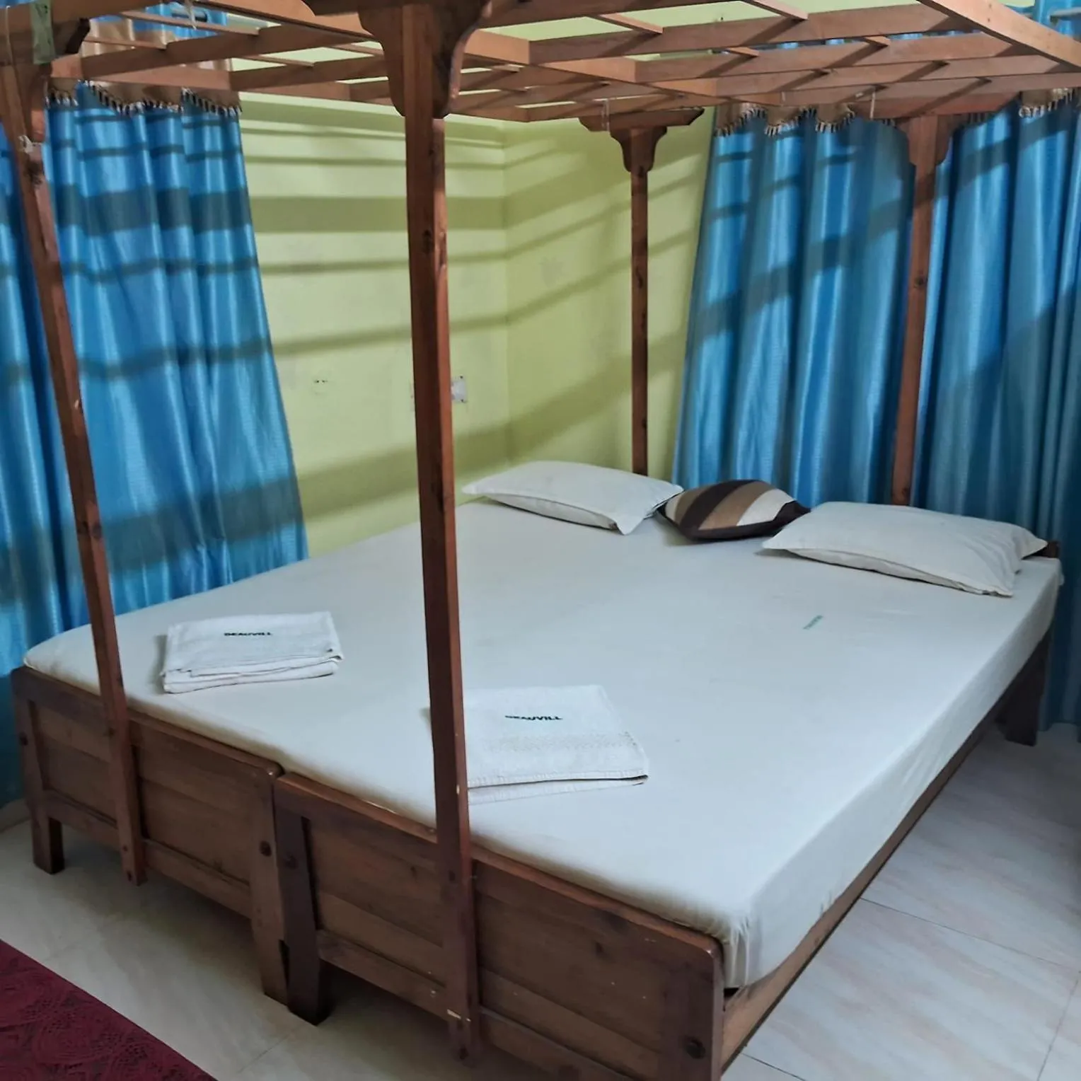 Bed in Deauvill Home Stay