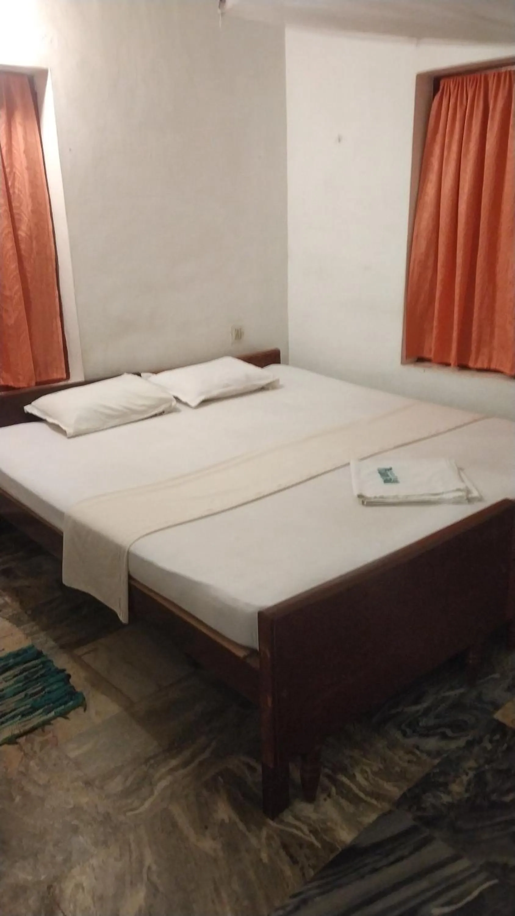 Bed in Deauvill Home Stay