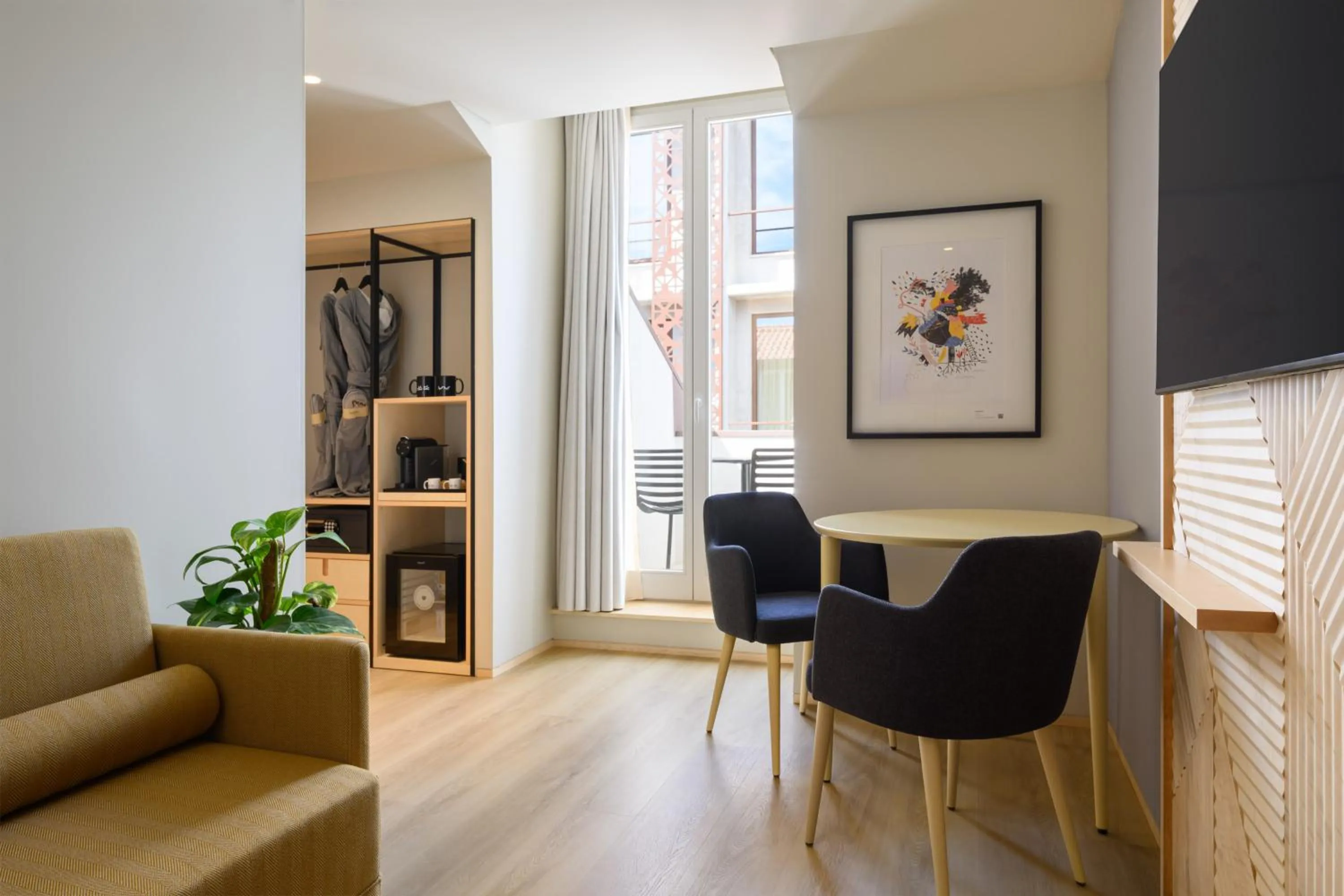 Communal lounge/ TV room in INNSiDE by Meliá Braga Centro