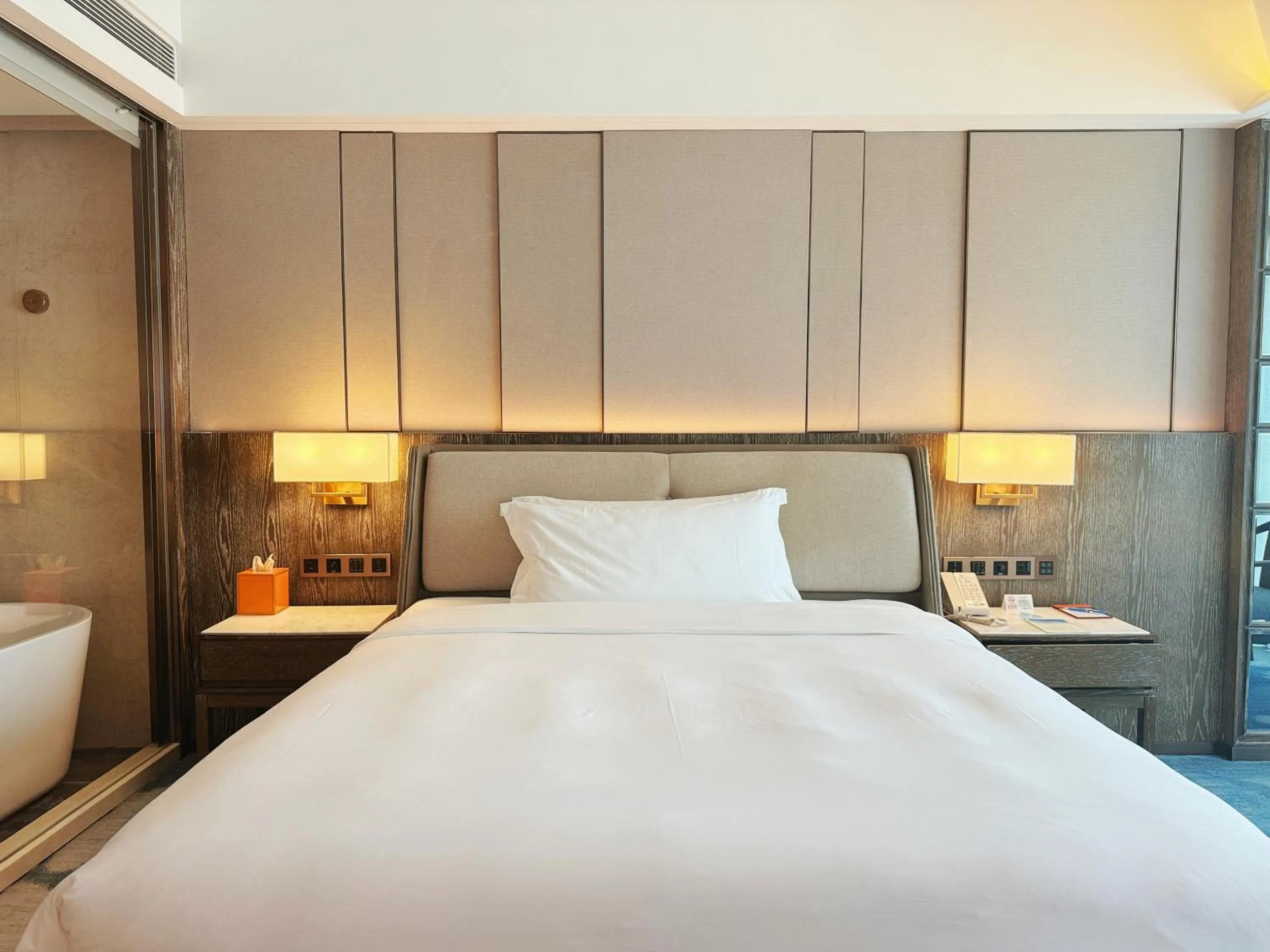 Bed in Beijing Xiamenair Jianianhua Hotel