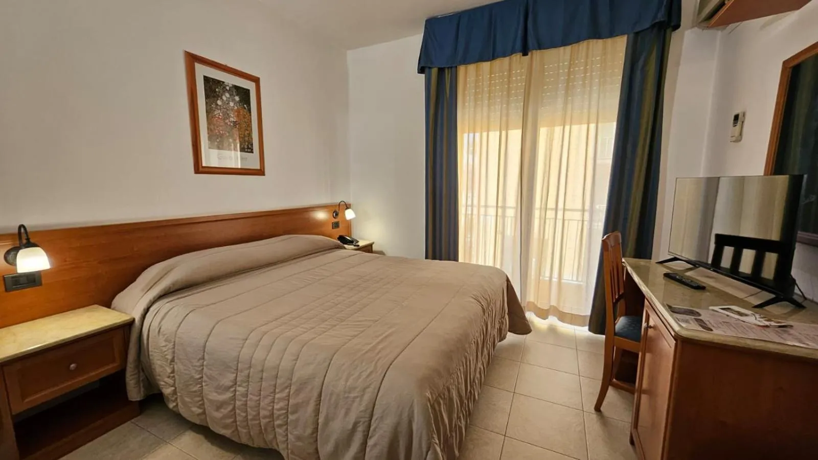 Photo of the whole room, Bed in GH Hotel