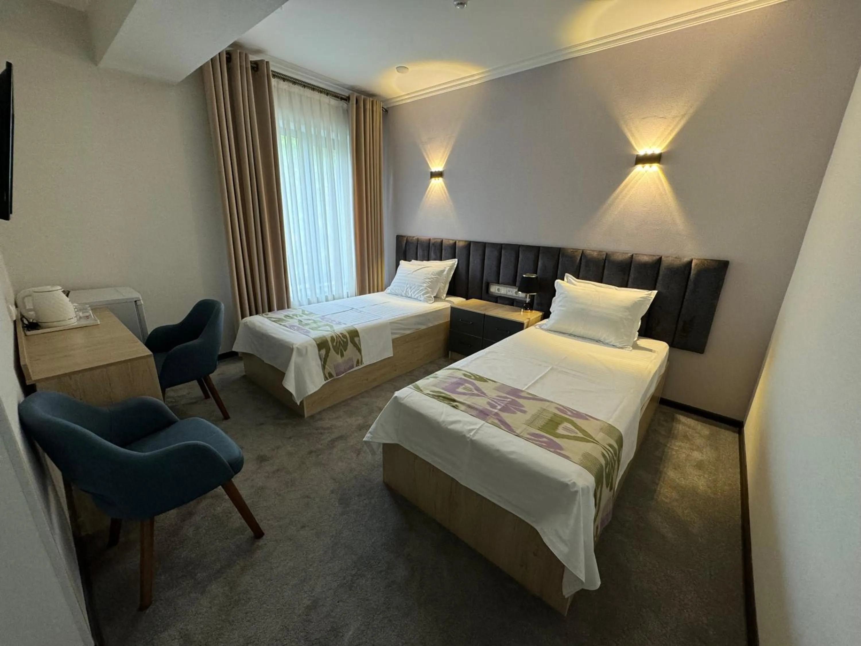 Bed in DSF GARDEN HOTEL