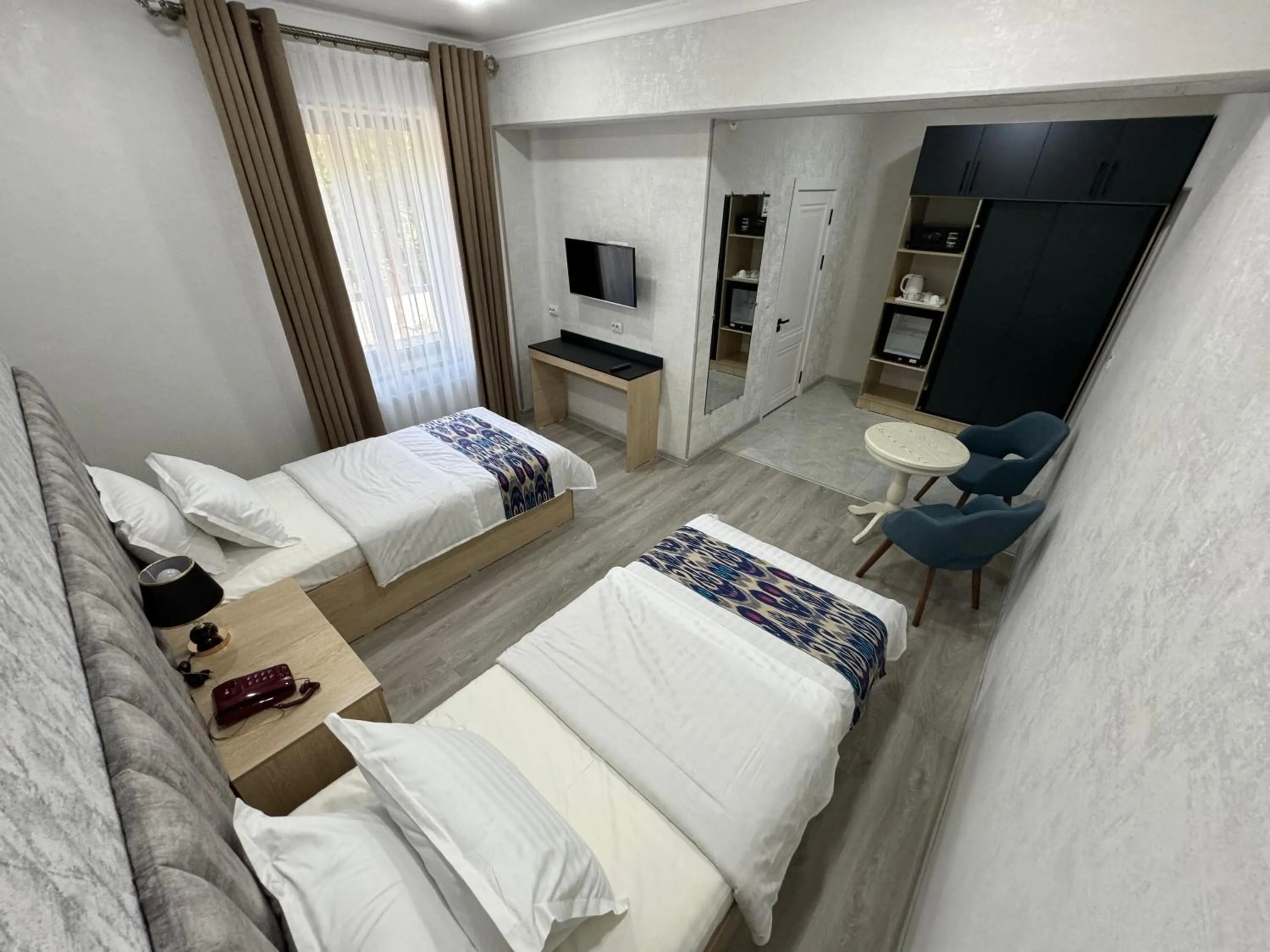 Photo of the whole room, Bed in DSF GARDEN HOTEL