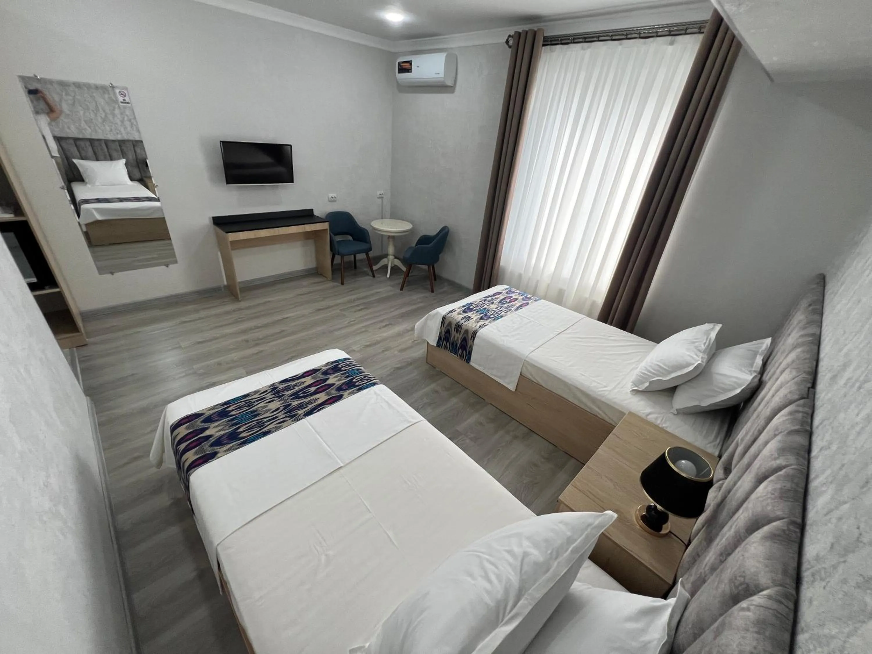 Bed in DSF GARDEN HOTEL