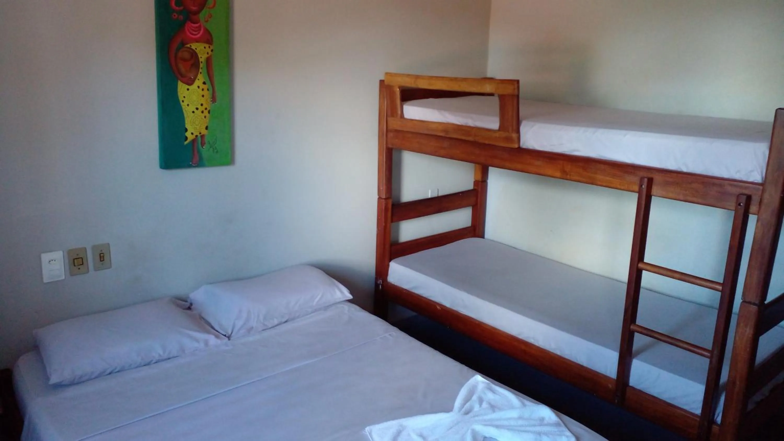 Bed in Pousada da Ale