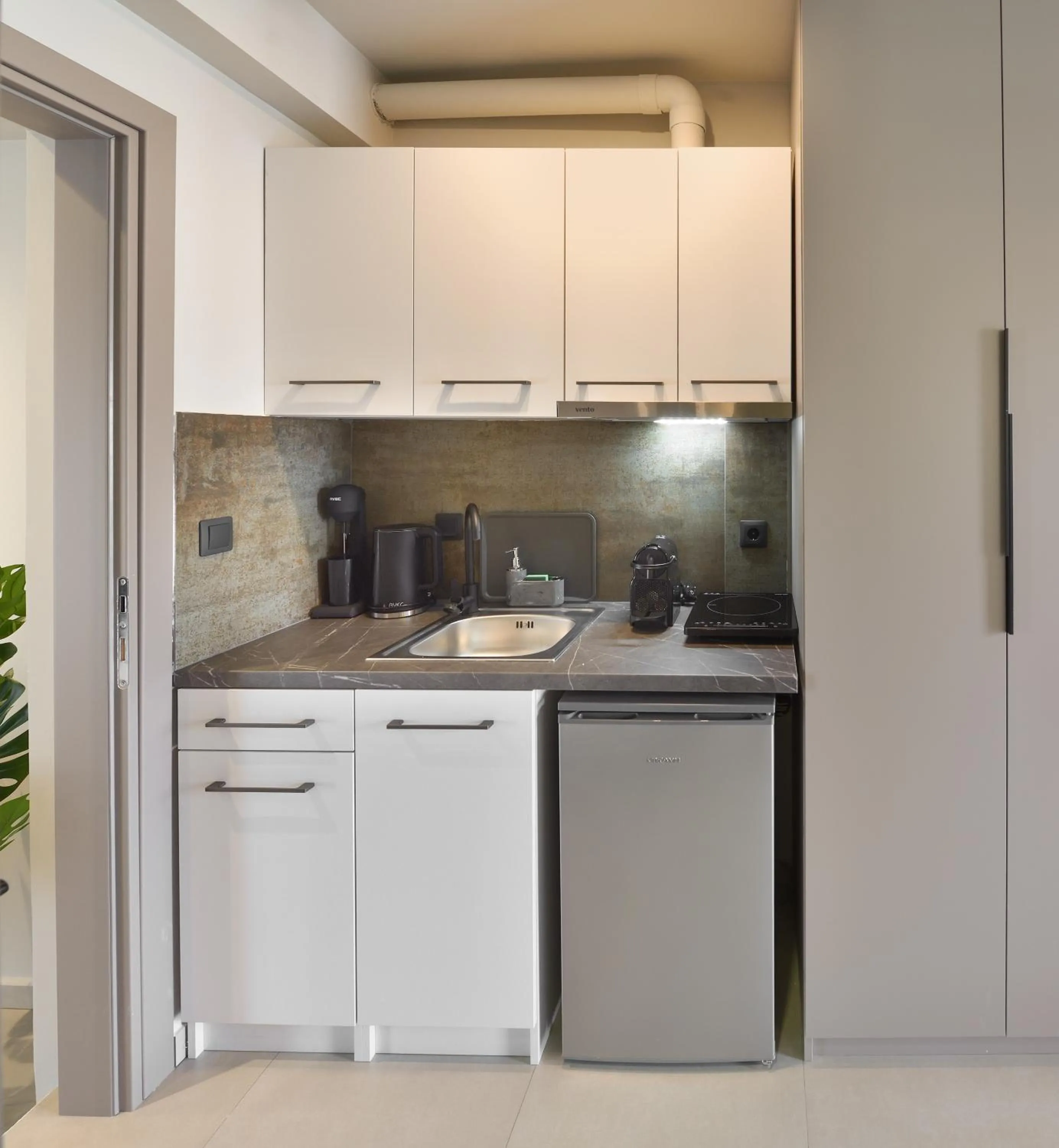 Kitchen or kitchenette in Olive All-Seasons Suites, Panel Hospitality Homes & Villas