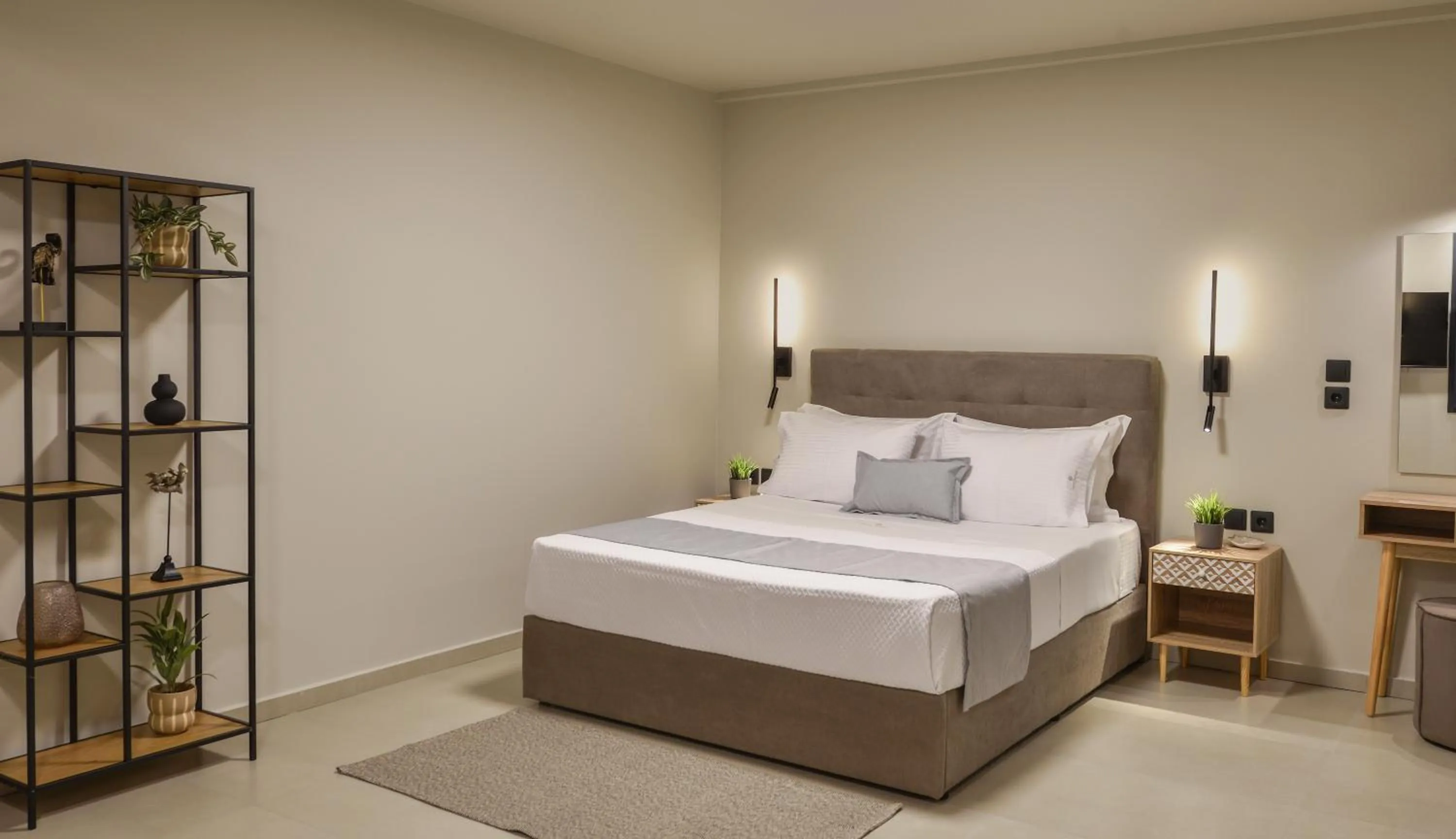 Bed in Olive All-Seasons Suites, Panel Hospitality Homes & Villas