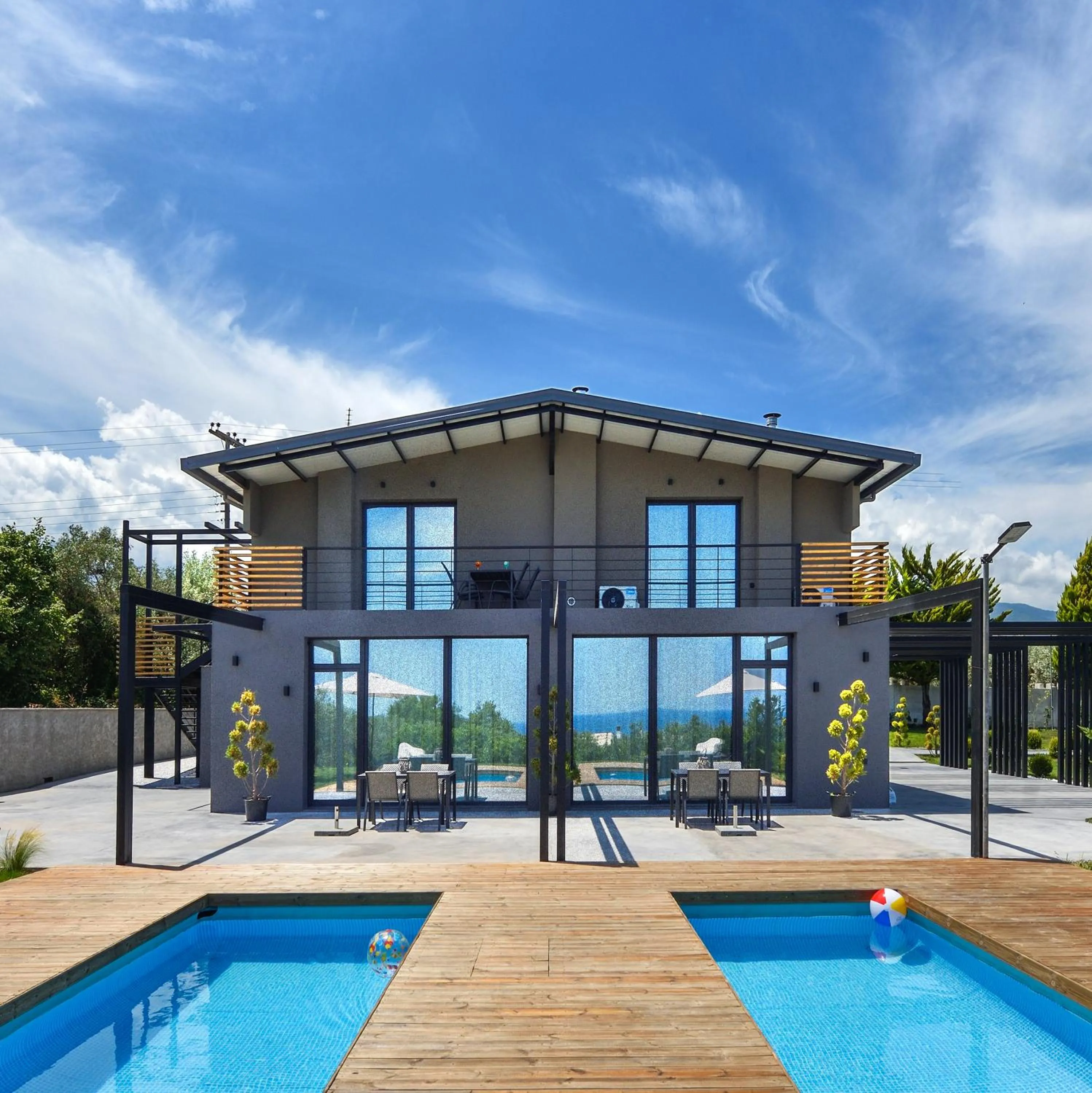 Property building in Olive All-Seasons Suites, Panel Hospitality Homes & Villas