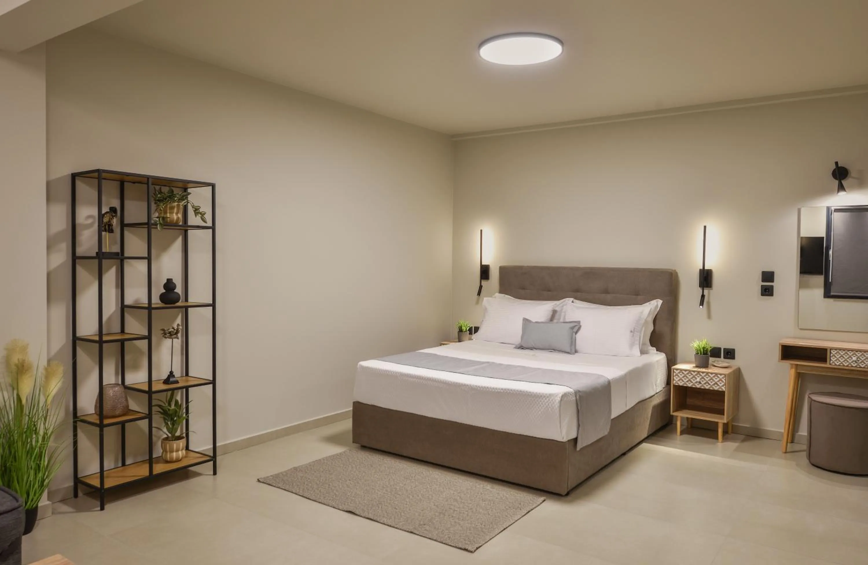 Bed in Olive All-Seasons Suites, Panel Hospitality Homes & Villas