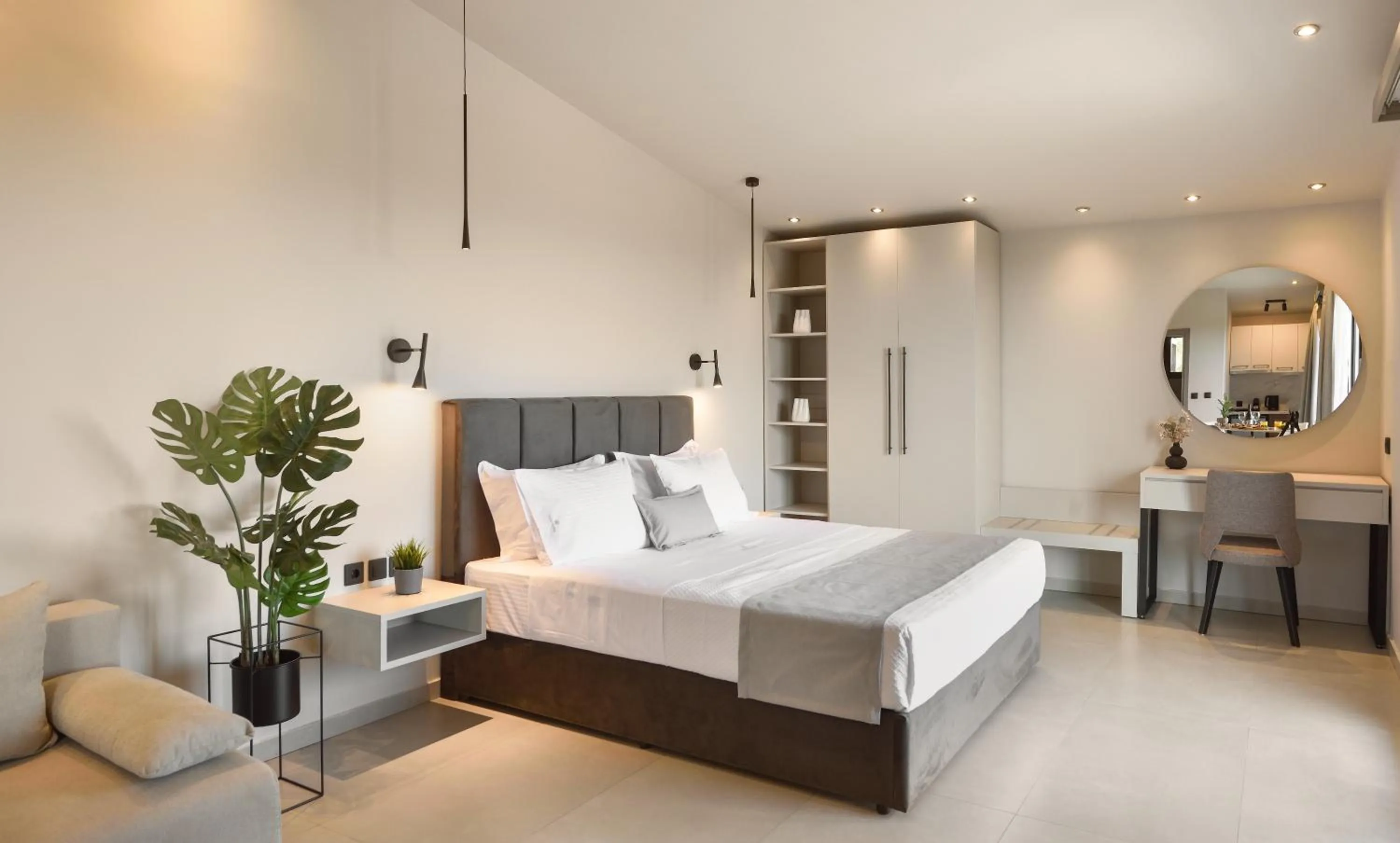 Bed in Olive All-Seasons Suites, Panel Hospitality Homes & Villas