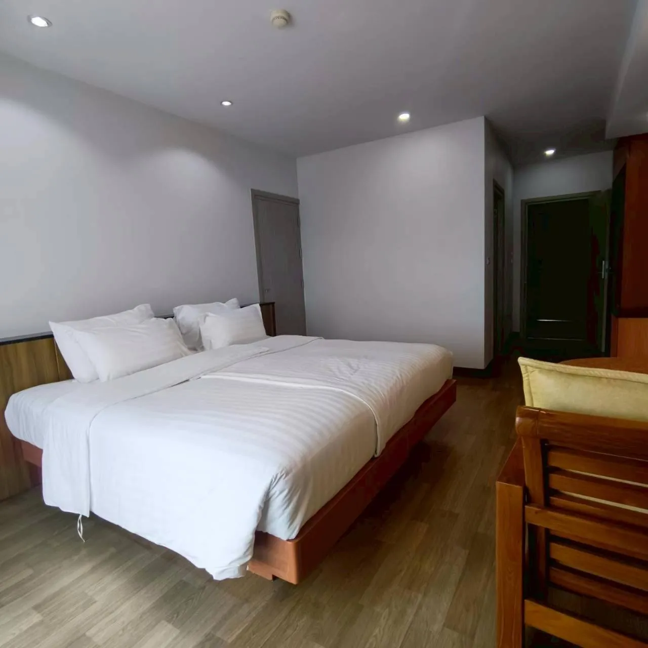 Bed in Cozy Donmueang Hotel