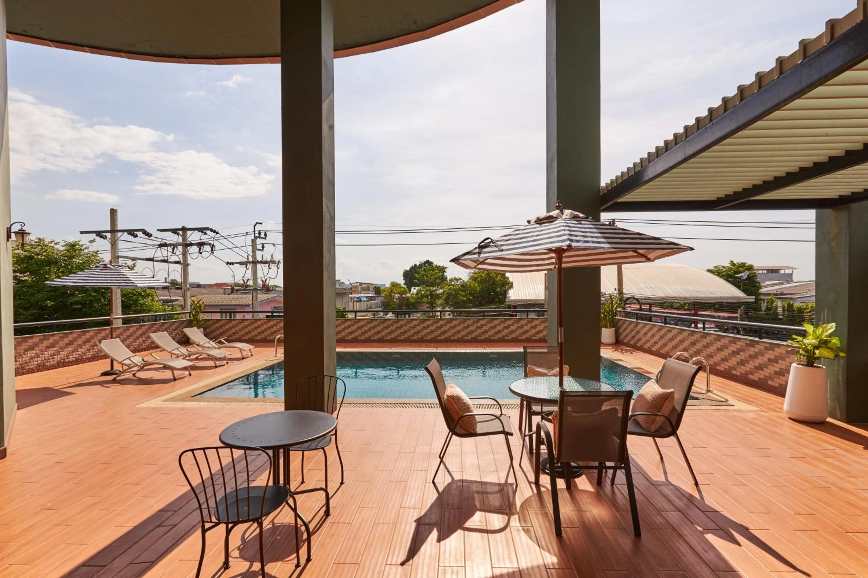 Swimming pool in NJOY Prestige Grand Hotel Don Mueang