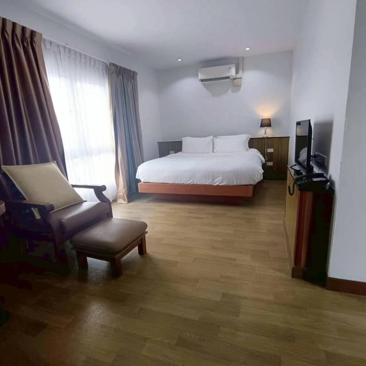 Bed in Cozy Donmueang Hotel