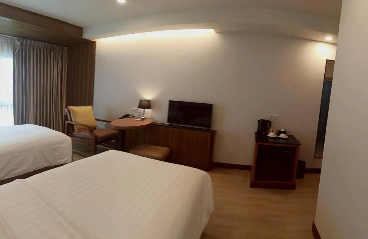 Bed in Cozy Donmueang Hotel