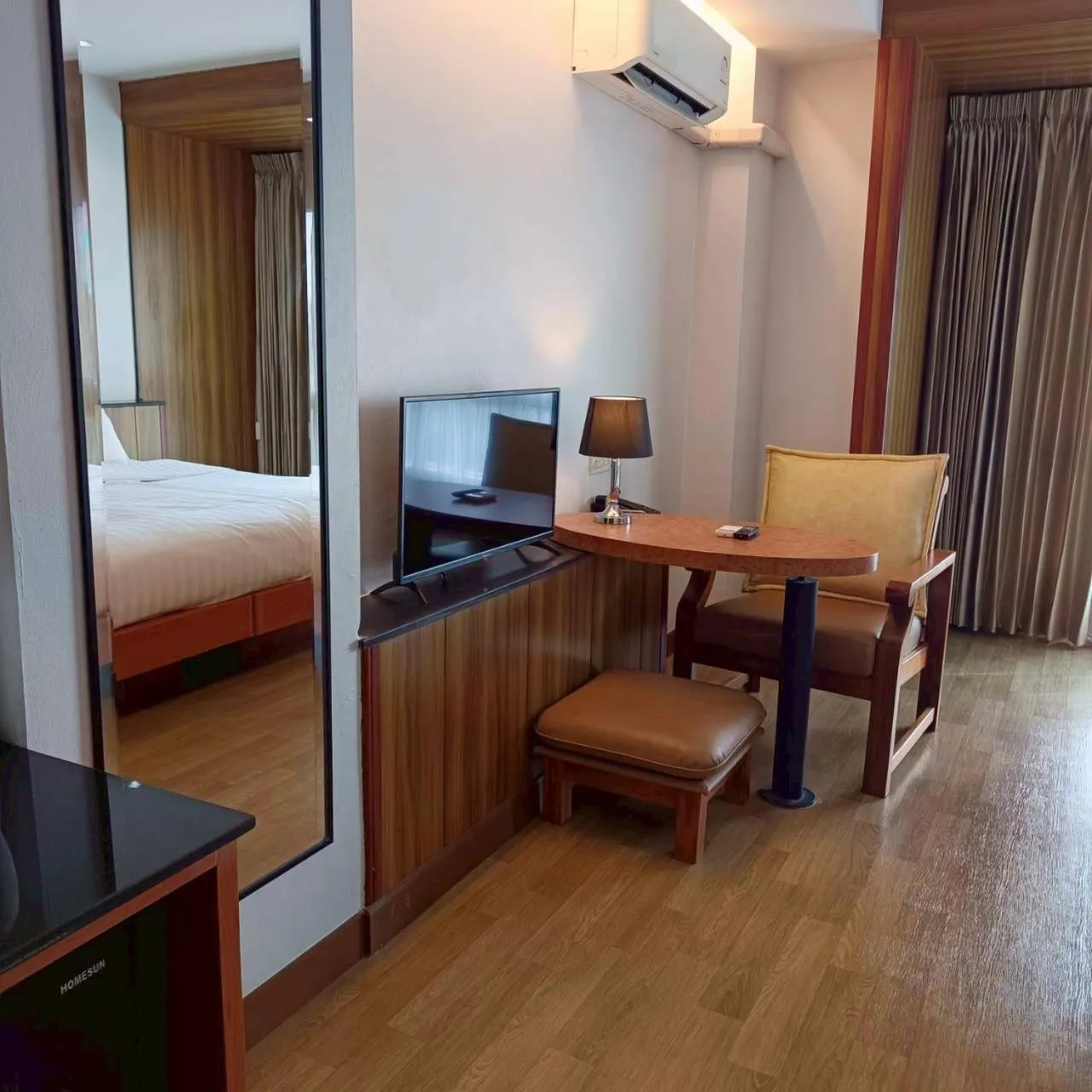 Bed in Cozy Donmueang Hotel