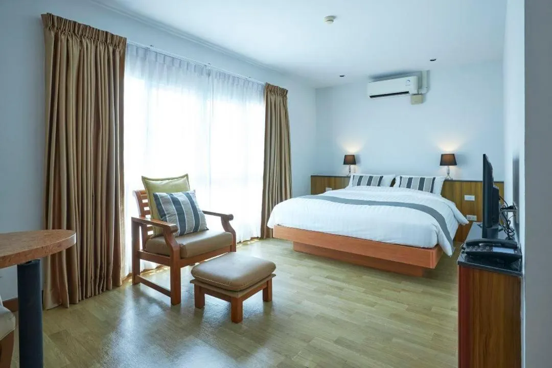 Bed in Cozy Donmueang Hotel